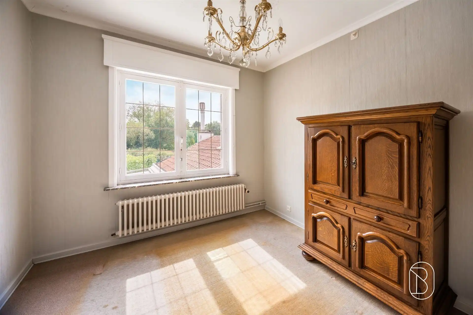 Degelijke woning met veel potentieel & aangename tuin  foto 12