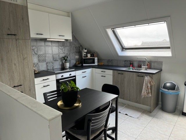 Knus 1 slaapkamer appartement te koop in het centrum van Maasmechelen, ideaal als investering! foto 4