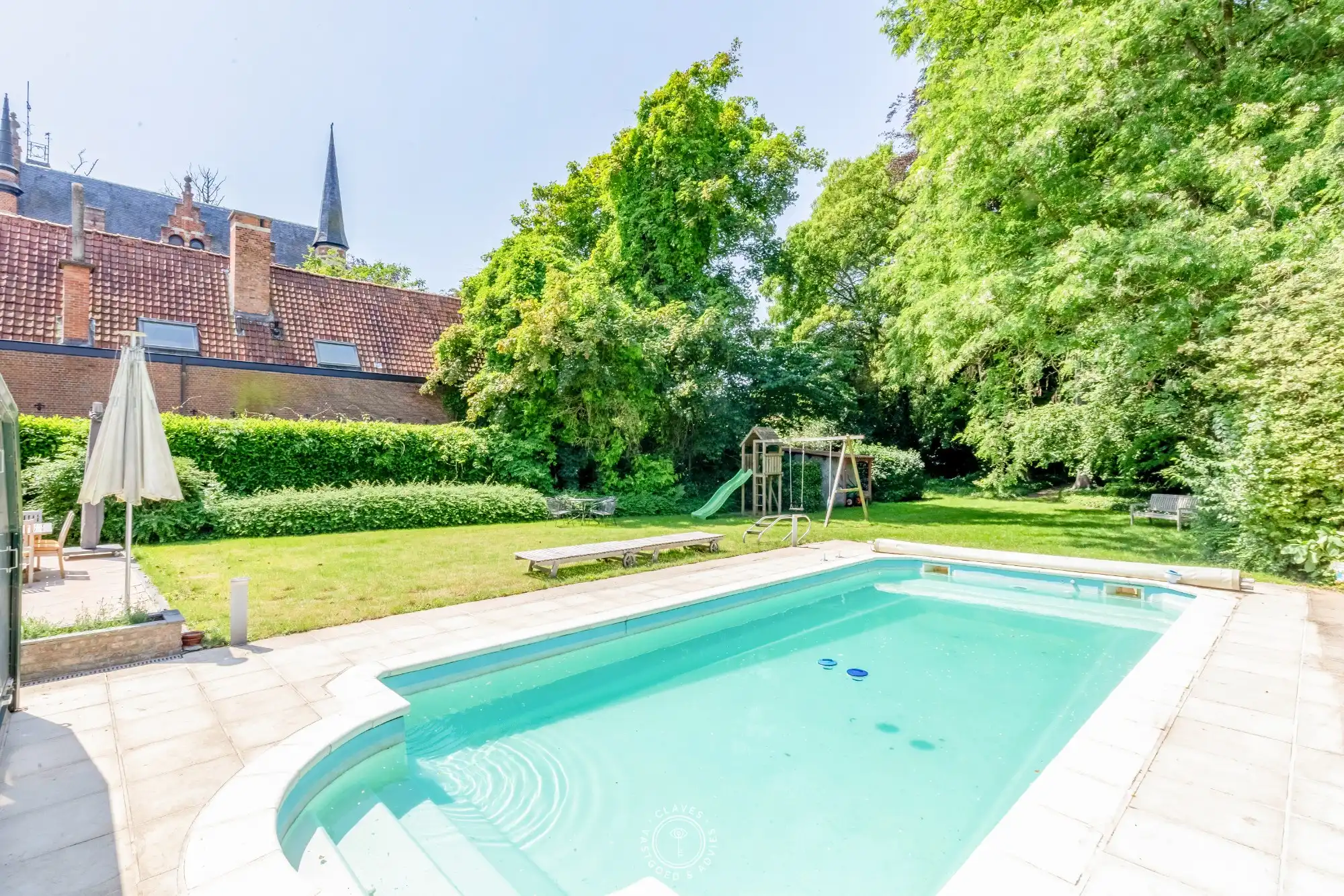 Welgelegen villa met praktijk en wonderlijke tuin foto 22