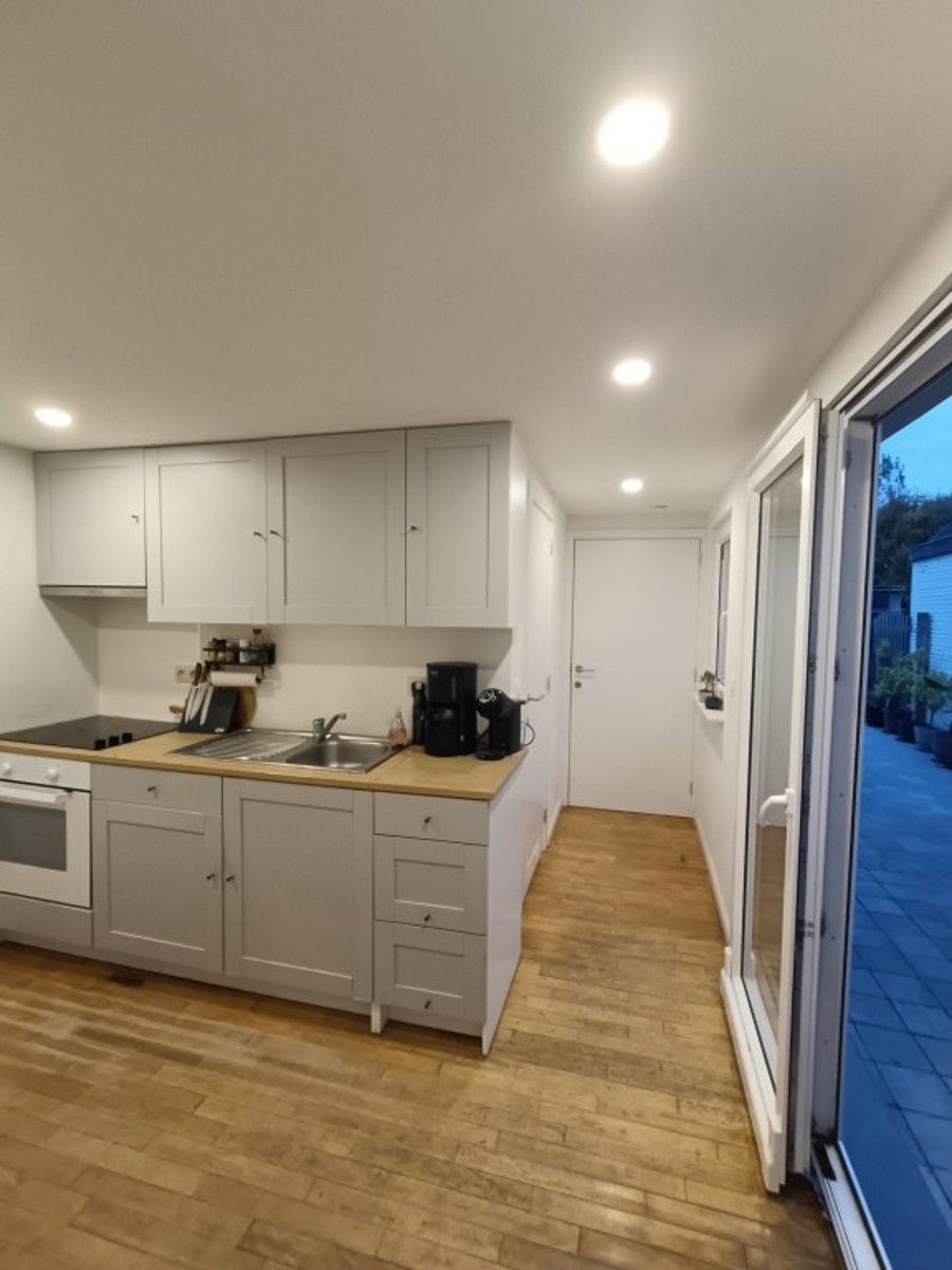 Gelijkvloers appartement mét tuin foto 13