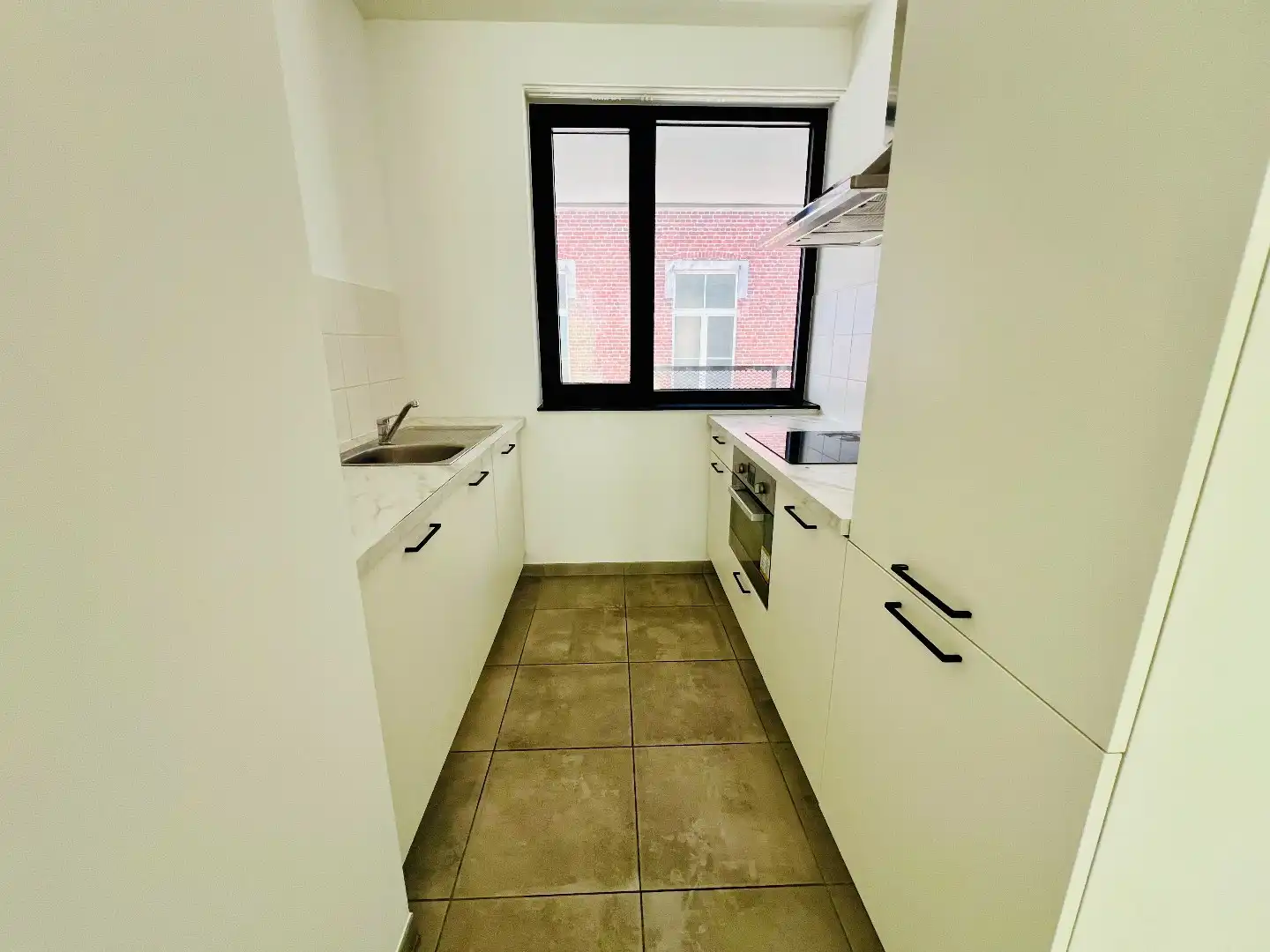 Prachtige rijwoning in centrum met 2 slpks en terras foto 5