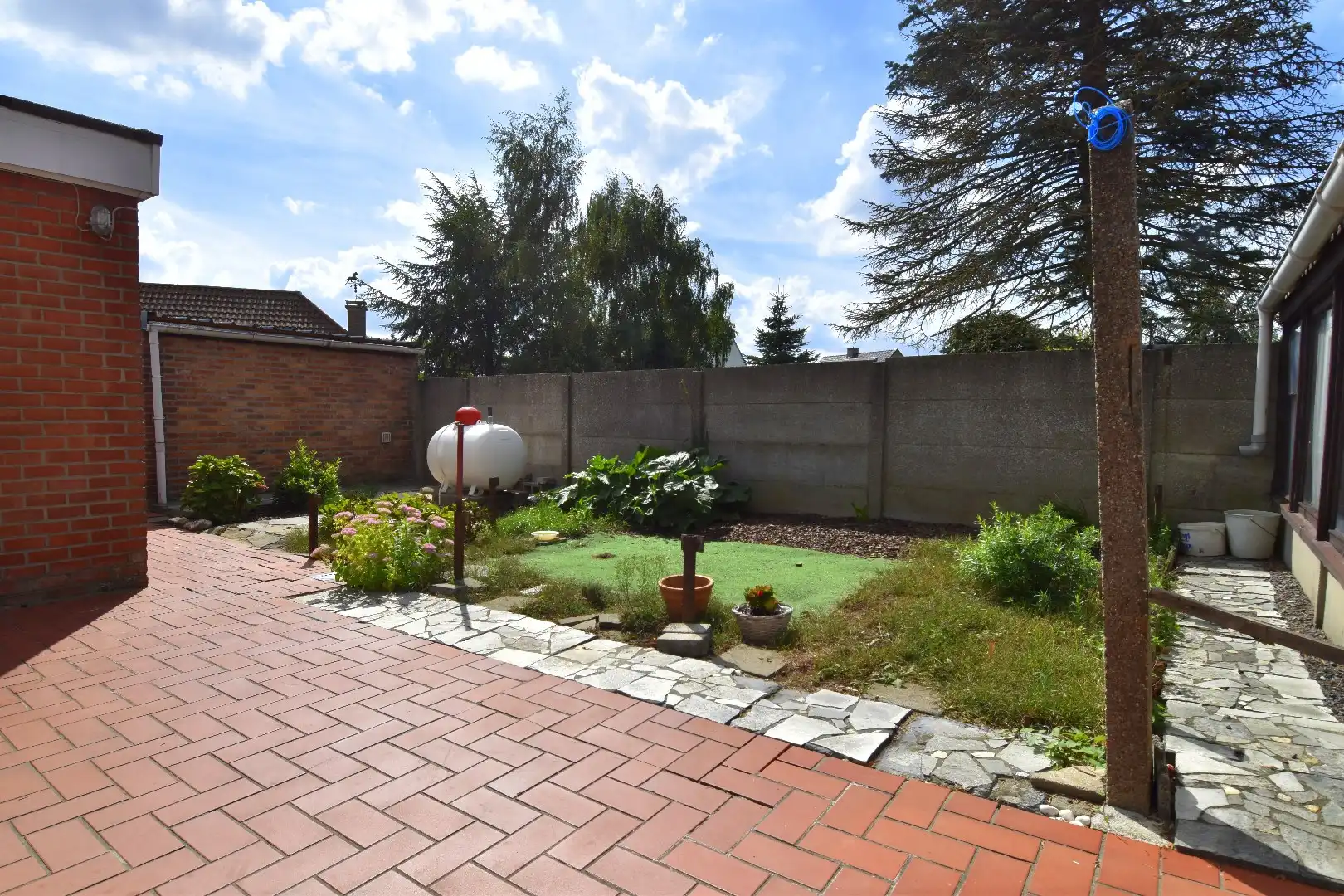 Woning met veel potentieel, garage en charmante tuin te koop in Kuurne foto 11