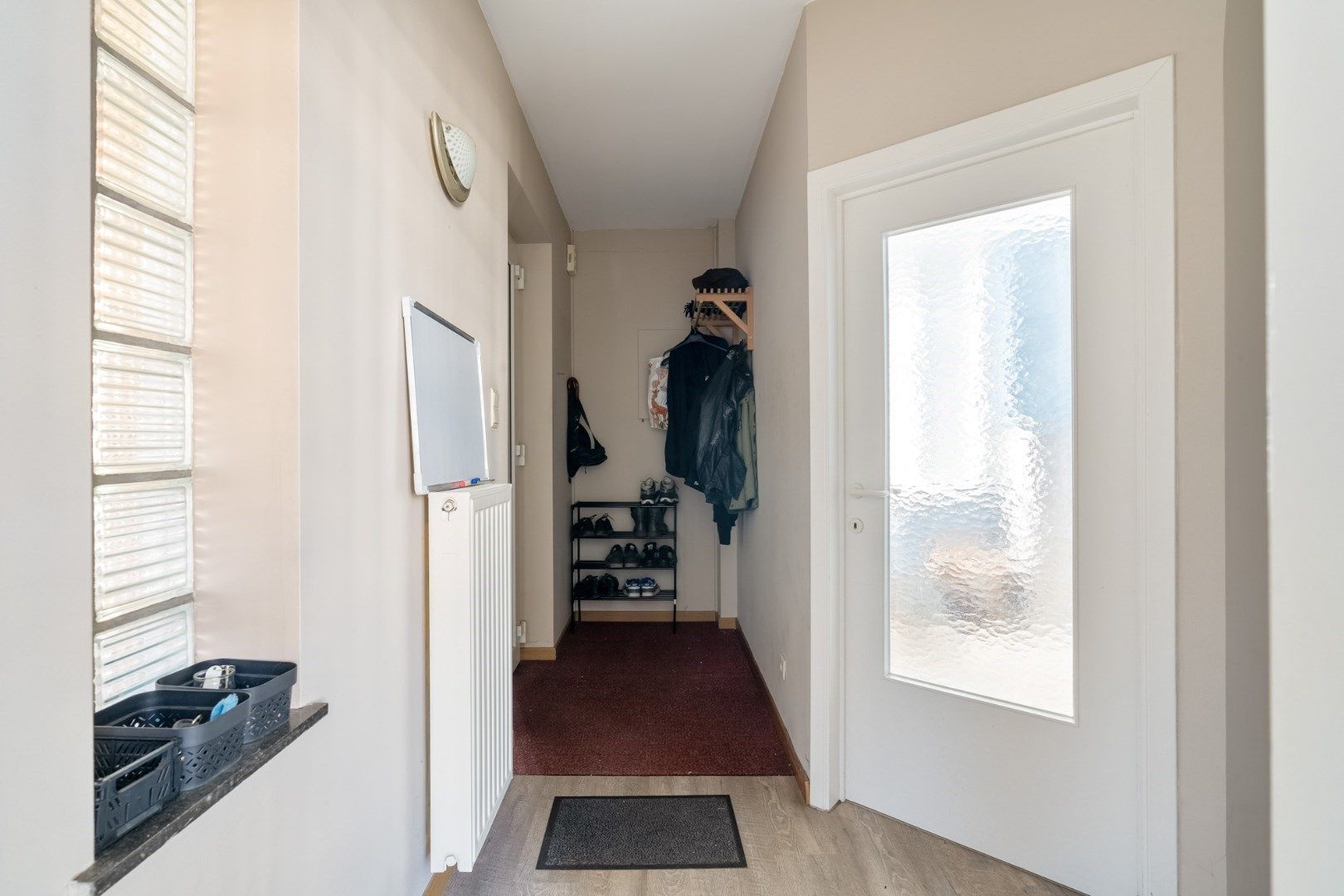 Duplexappartement (189 m²) met overdekt terras en garage in een statige herenwoning in het centrum van Hoeselt foto 7