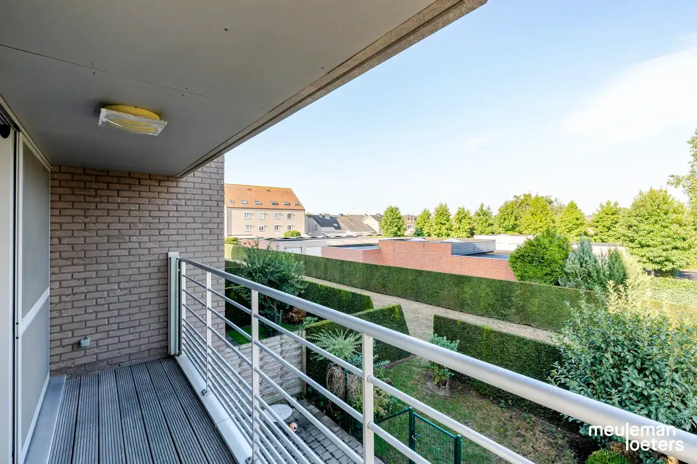 Lichtrijk driegevel appartement met ondergrondse garagebox foto 13