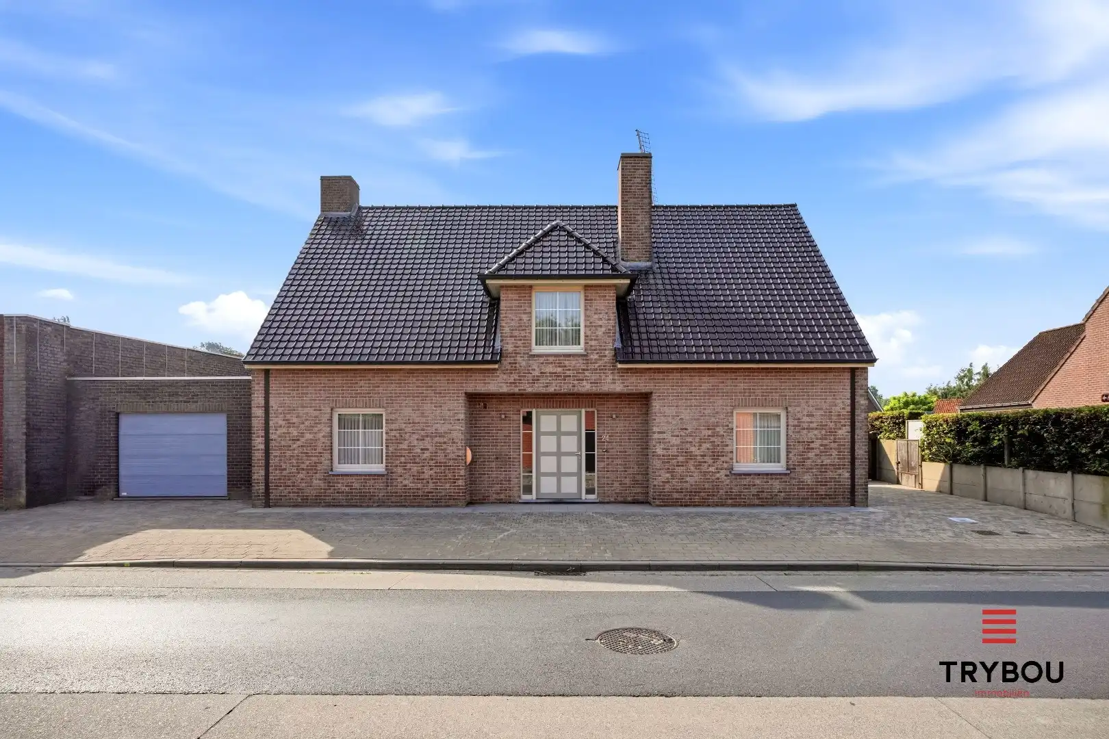 Ruime halfopen woning met 5 slaapkamers te koop in Werken met garage en ruime tuin! foto {{pictureIndex}}