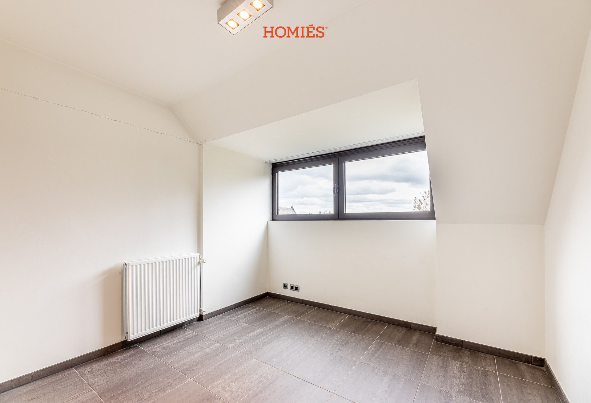 Ruim triplex appartement op strategische locatie foto 7