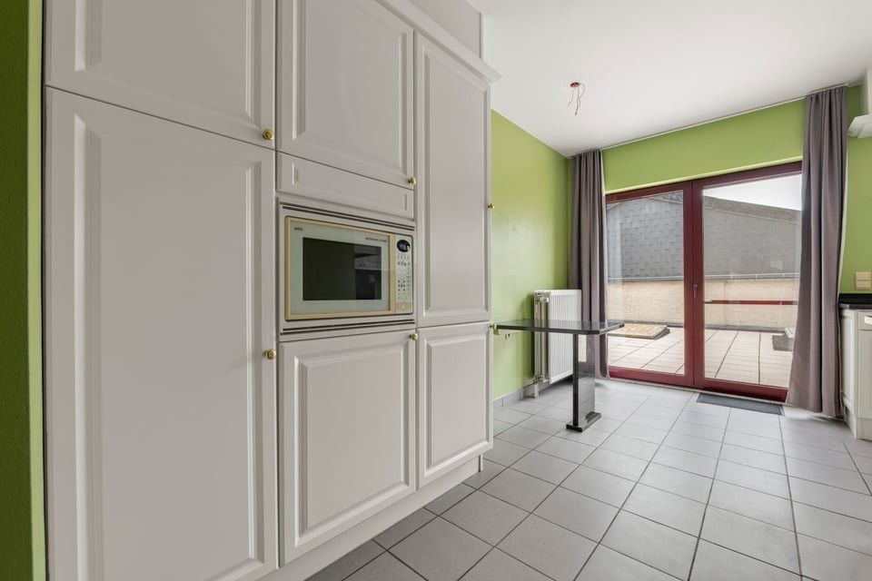 RUIM APPARTEMENT MET UITZONDERLIJK TERRAS VAN +50M² IN SINT-TRUIDEN foto 18