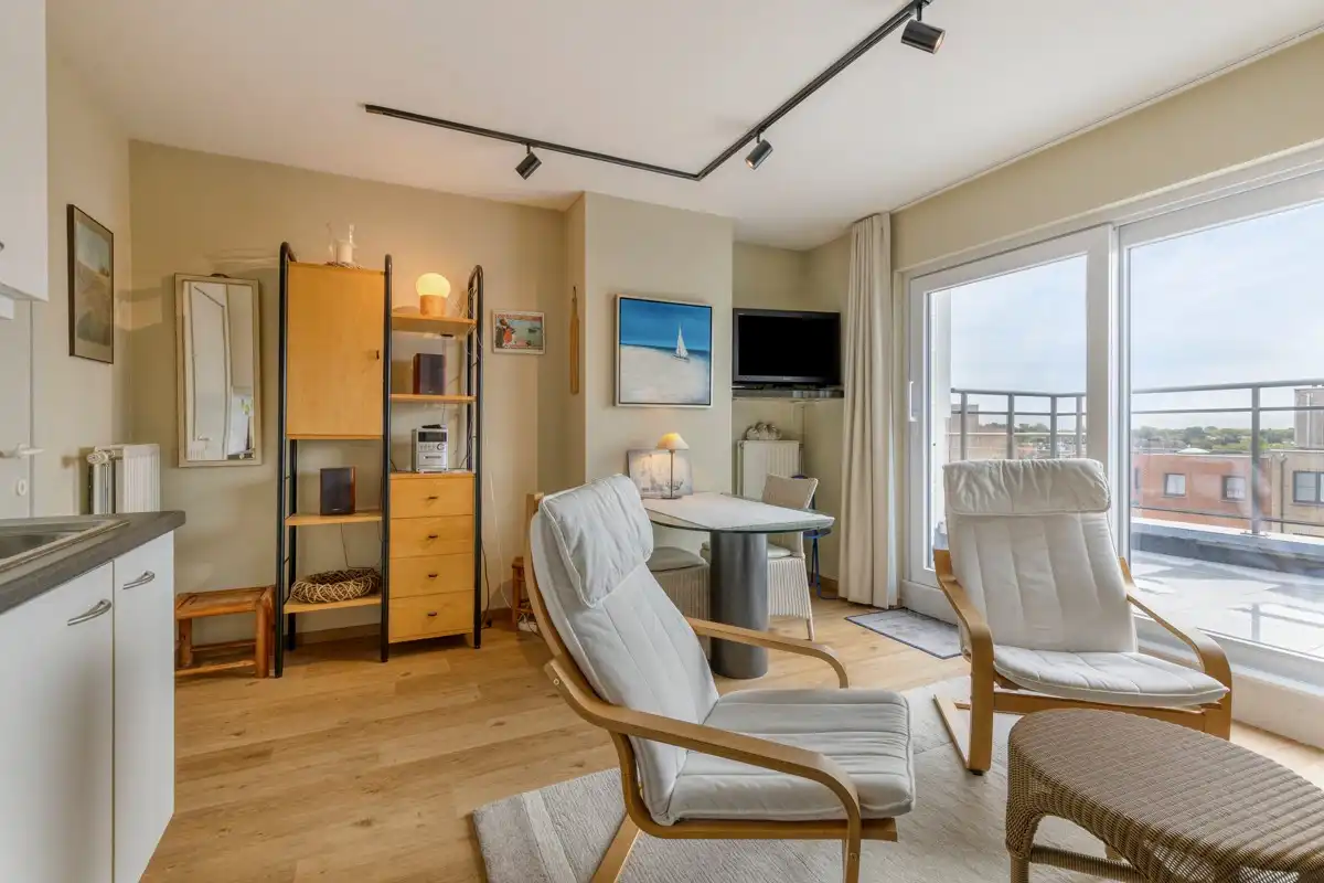 Appartement met 1 slaapkamer en twee ruime zonneterrassen, met een parkeerplaats in het gebouw die samen met het appartement aangekocht dient te worden. foto 8