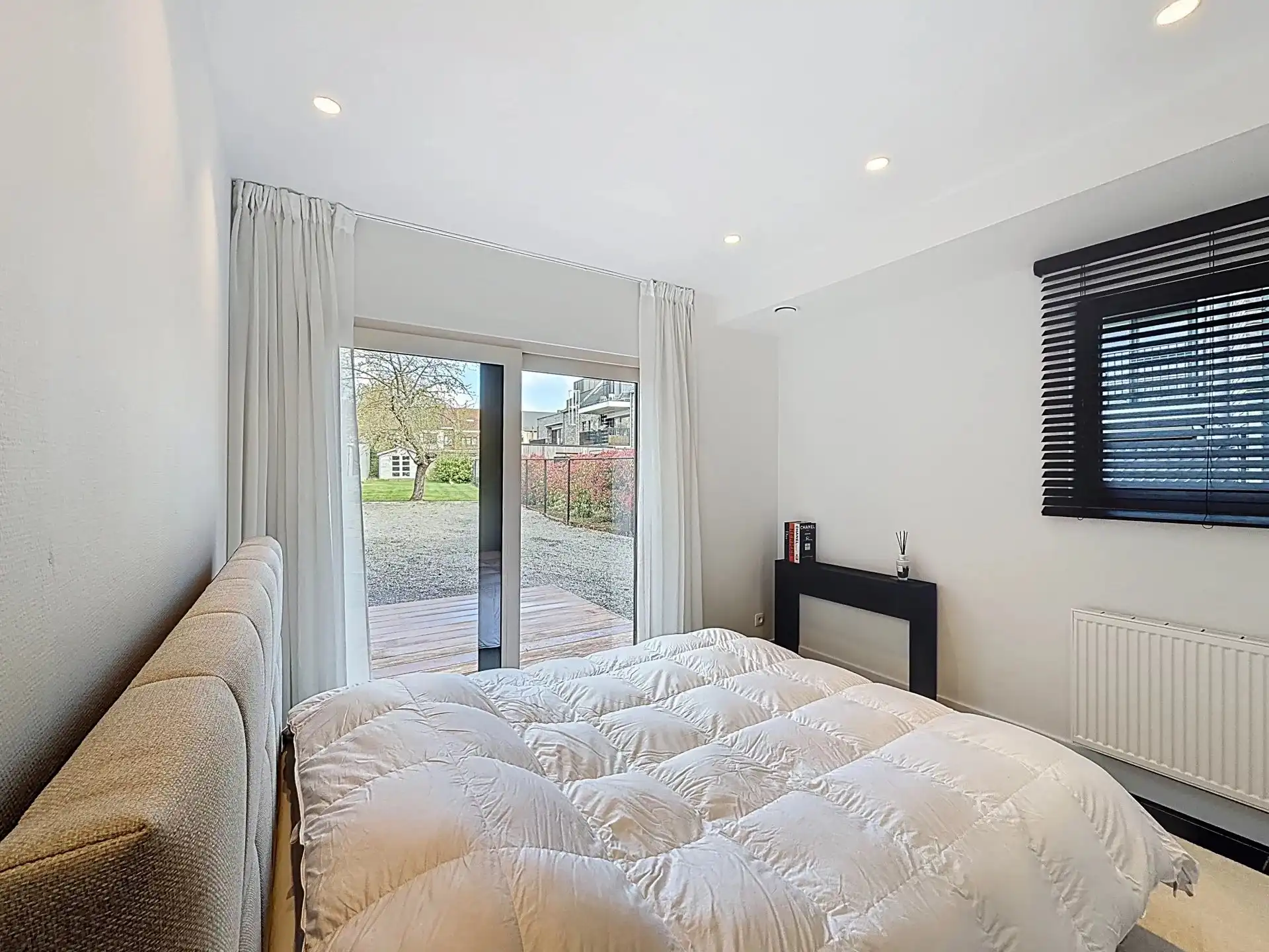 Zeer gezellig gelijkvloers appartement met 1 (mog. 2) slaapkamers, tuin, terras en staanplaats. foto 15