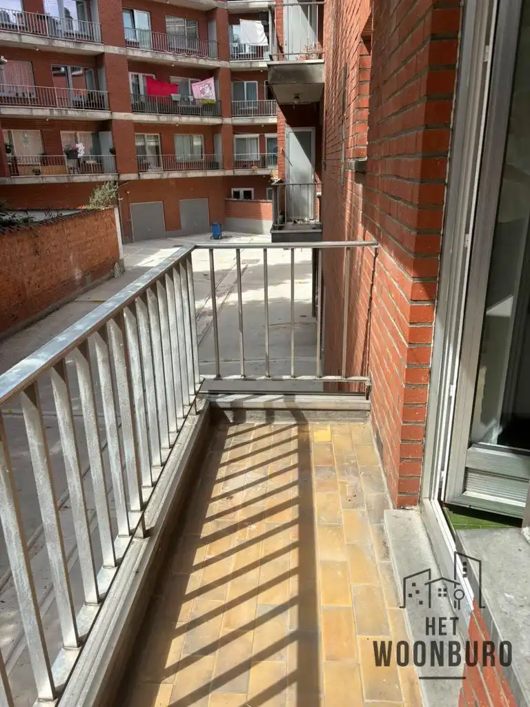 Appartement 1e verd. met terras en kelder foto 11