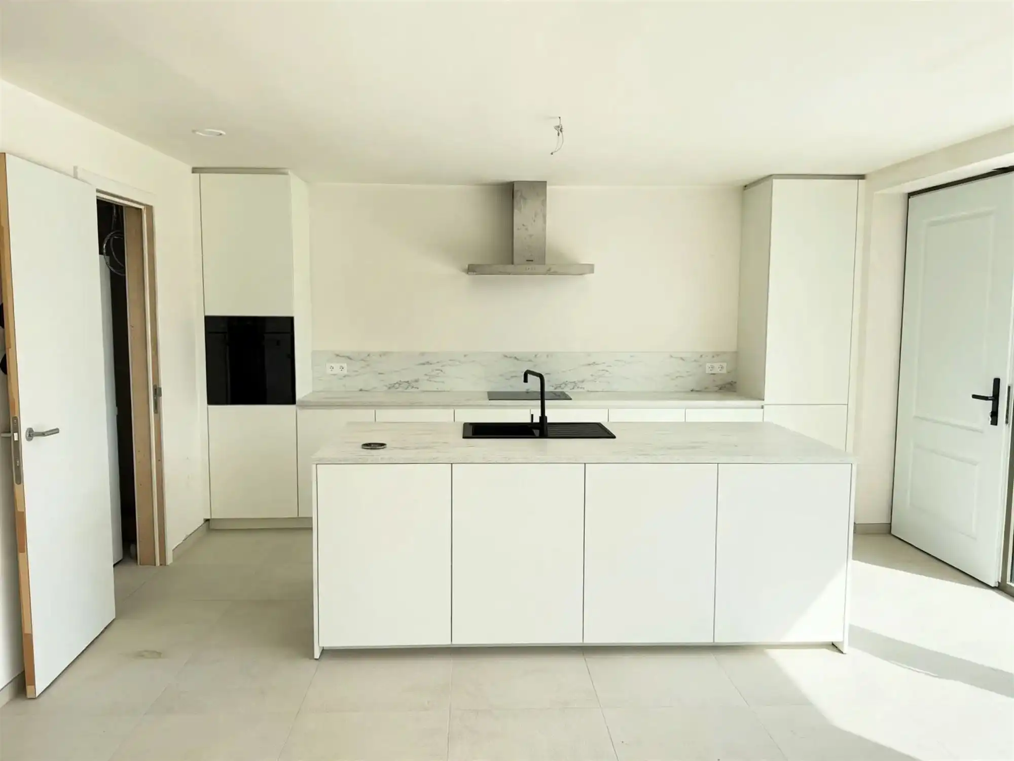 Nieuwbouwappartement met grote tuin en zonneterras foto 3