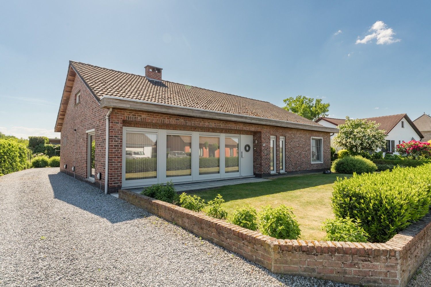 Gelijkvloerse 3 SLK woning op een mooi onderhoudsvriendelijk perceel foto 4