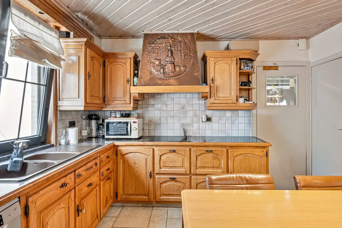 Strategisch gelegen handelspand met winkelruimte (bakkerij) met inpandige garage, grote werkruimte (ca. 145m²) en aangename tuin met open zicht in Ertvelde! foto 20