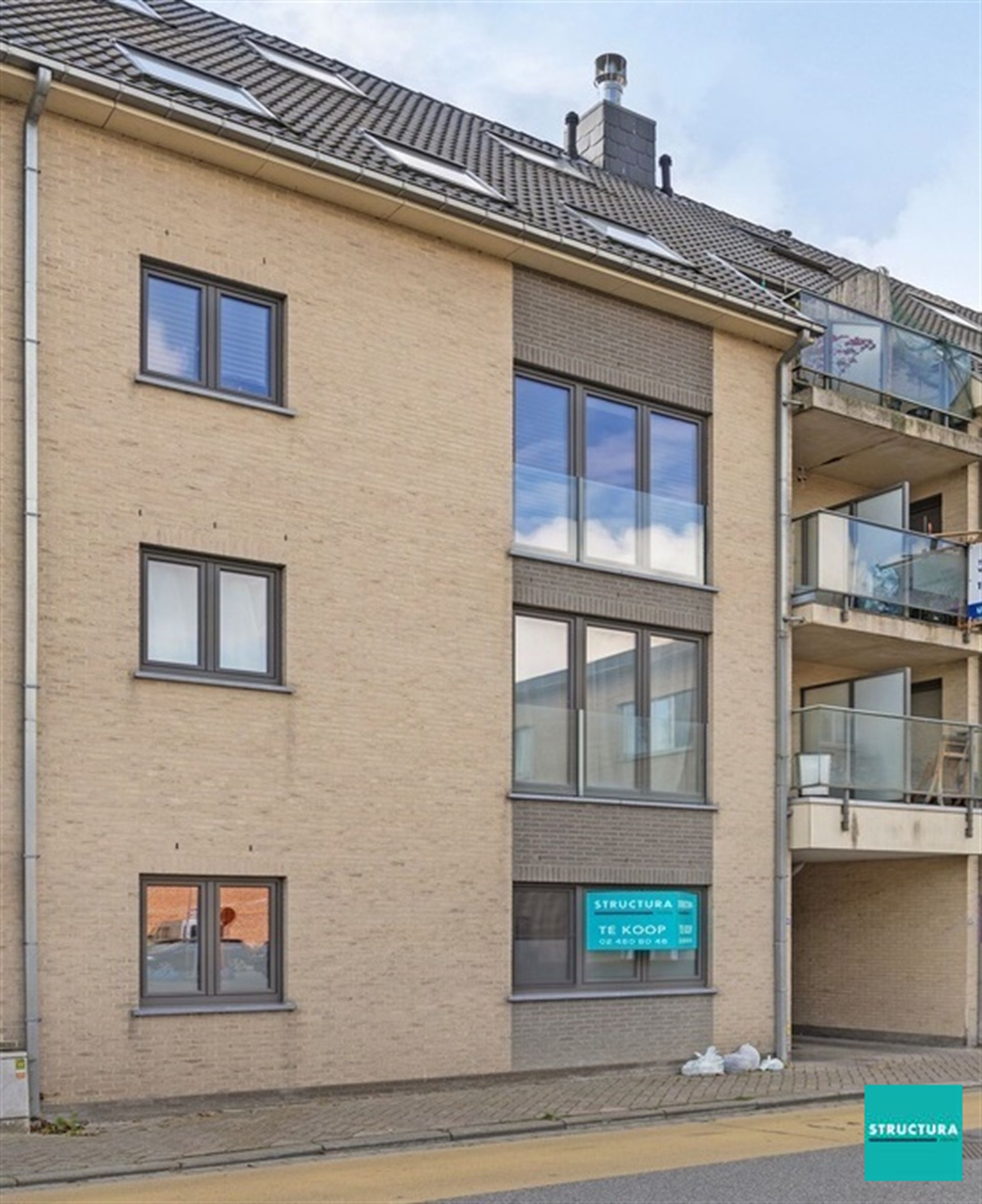 Gelijkvloers appartement met parking in Merchtem centrum foto 9