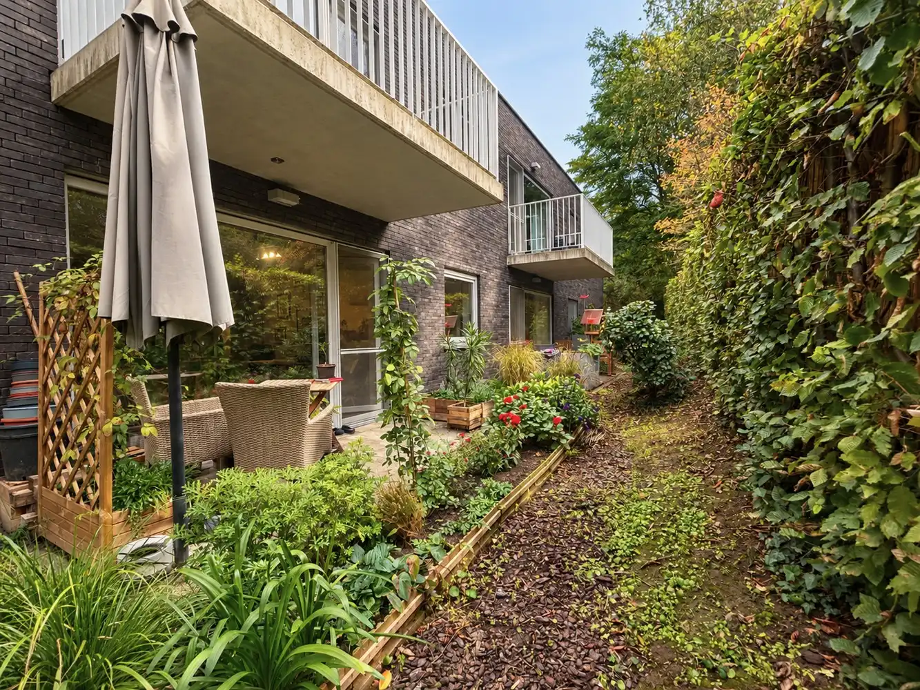 Gelijkvloers appartement met EPC label A, ruim terras en autostaanplaats foto 10