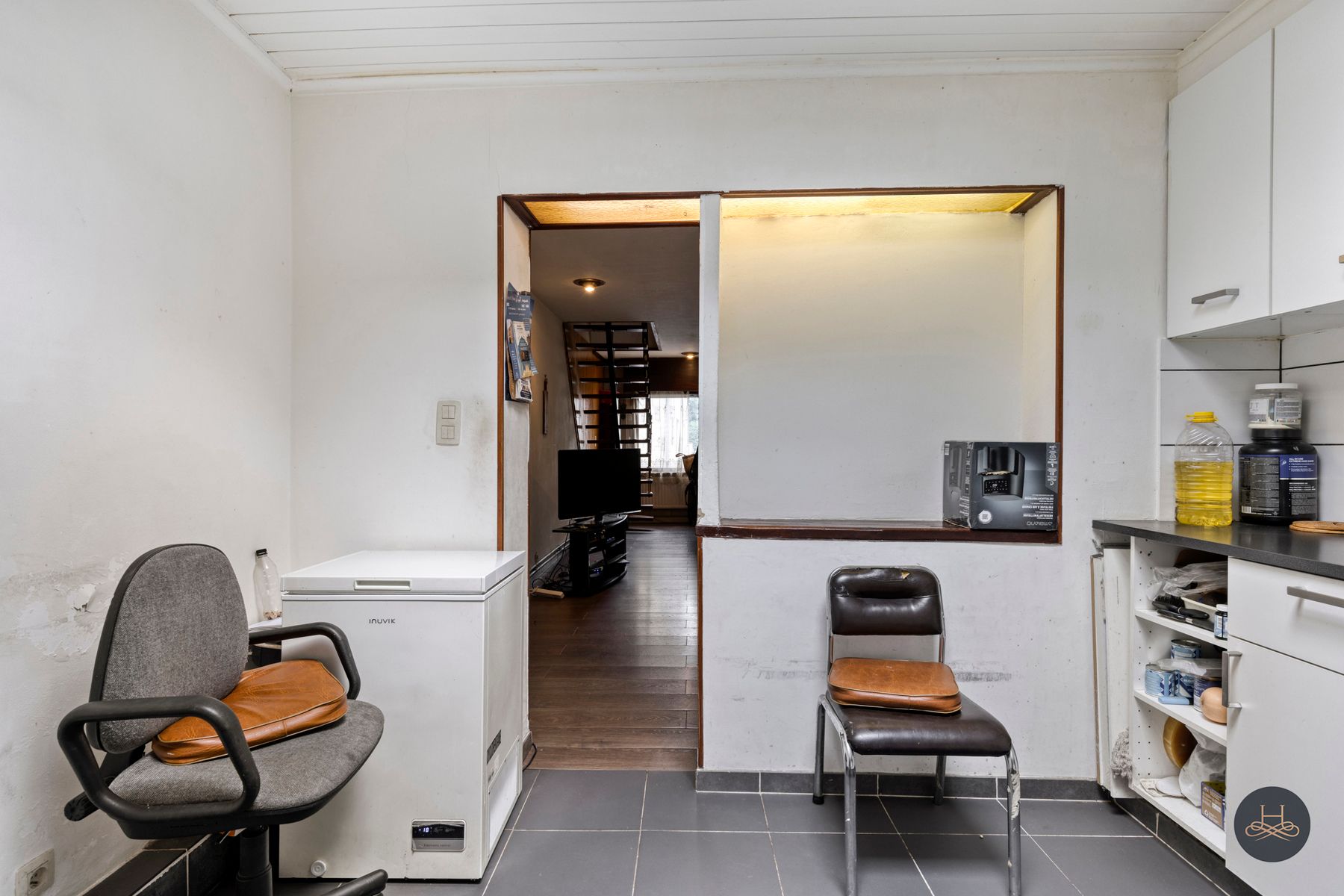 Gezellig centraal gelegen woning met potentieel foto 9