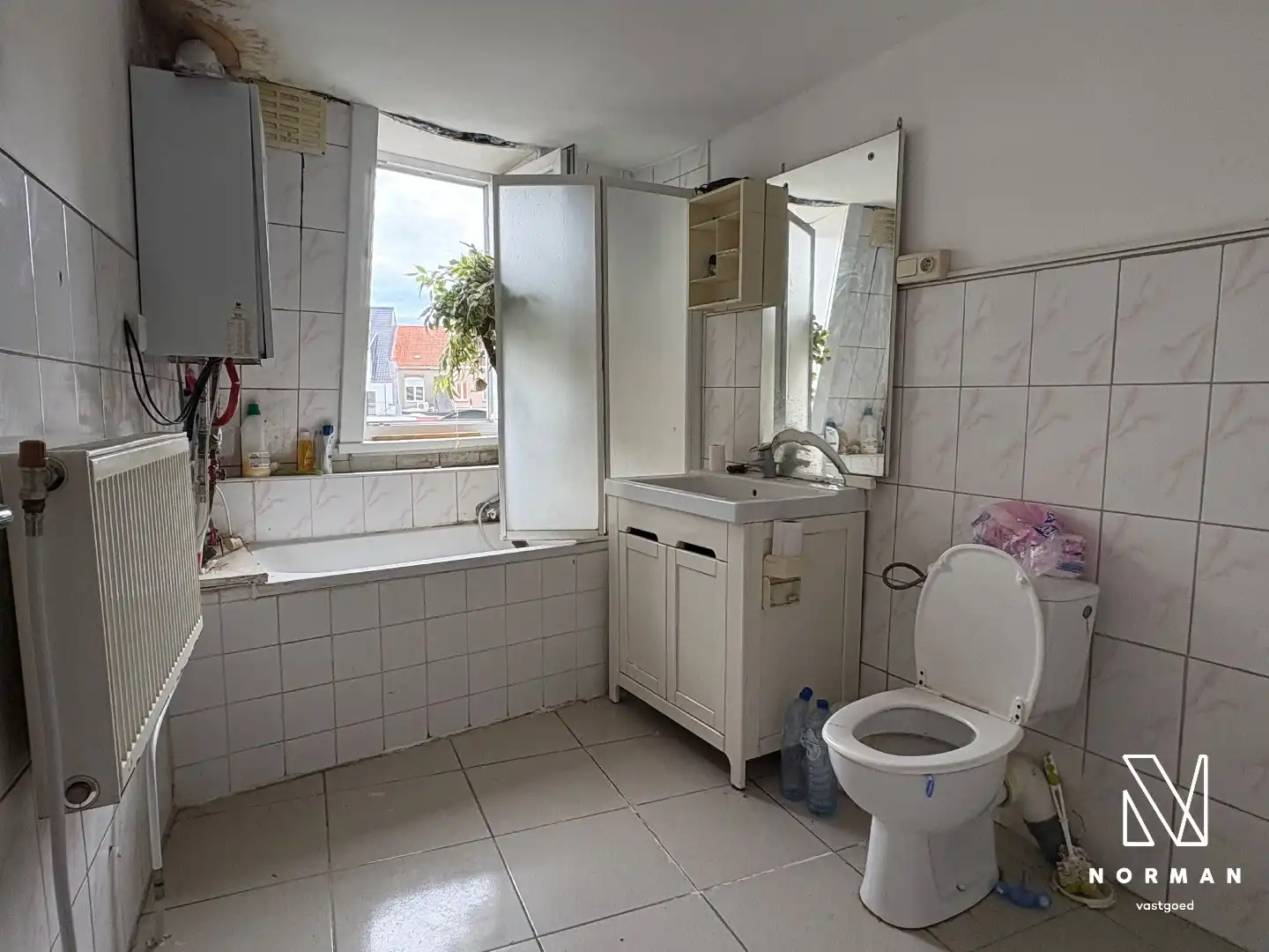 Te renoveren woning te koop in Harelbeke foto 4