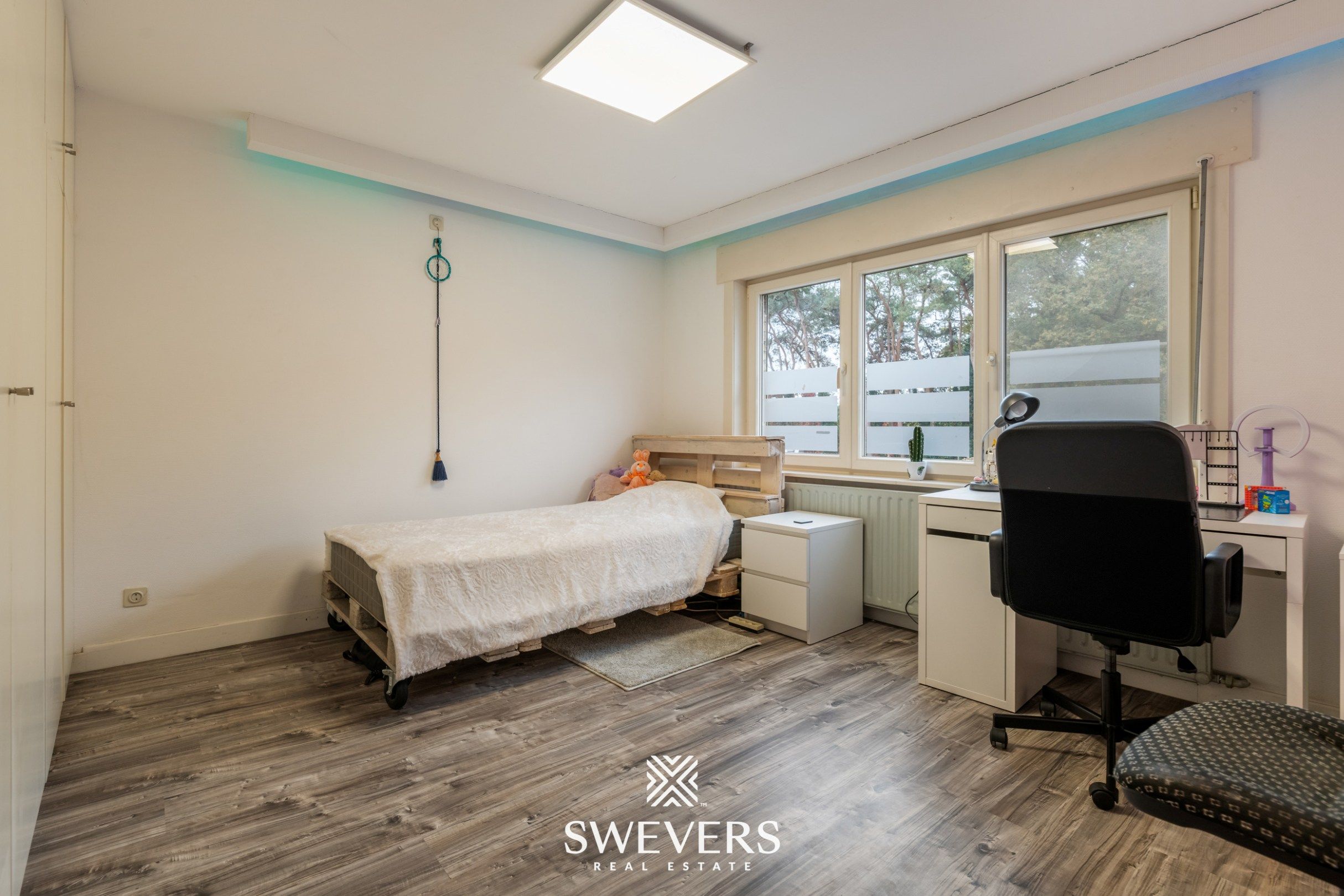 Instapklare gezinswoning met 3 slaapkamers, ruime kelder en zuidgerichte tuin in Beringen foto 21