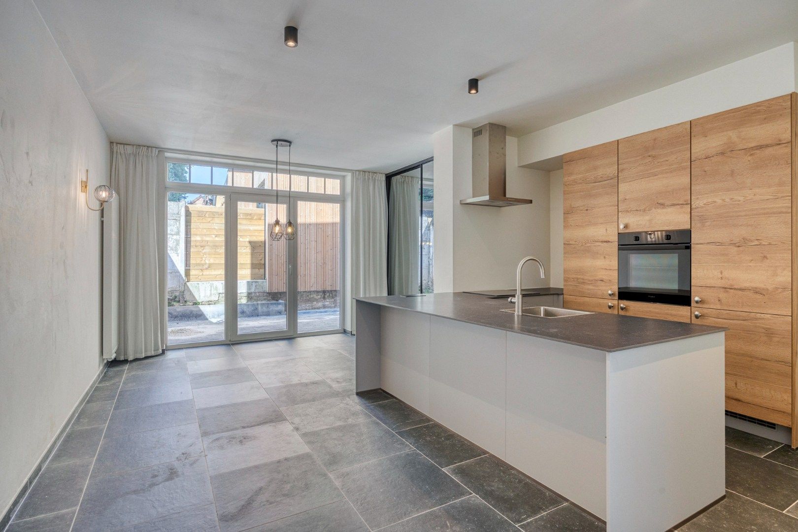 Totaal gerenoveerde woning met 4 slaapkamers en terras in het centrum van Leuven! – EPC 40 kWh/m² - bewoonbare oppervlakte 180 m²  foto 5
