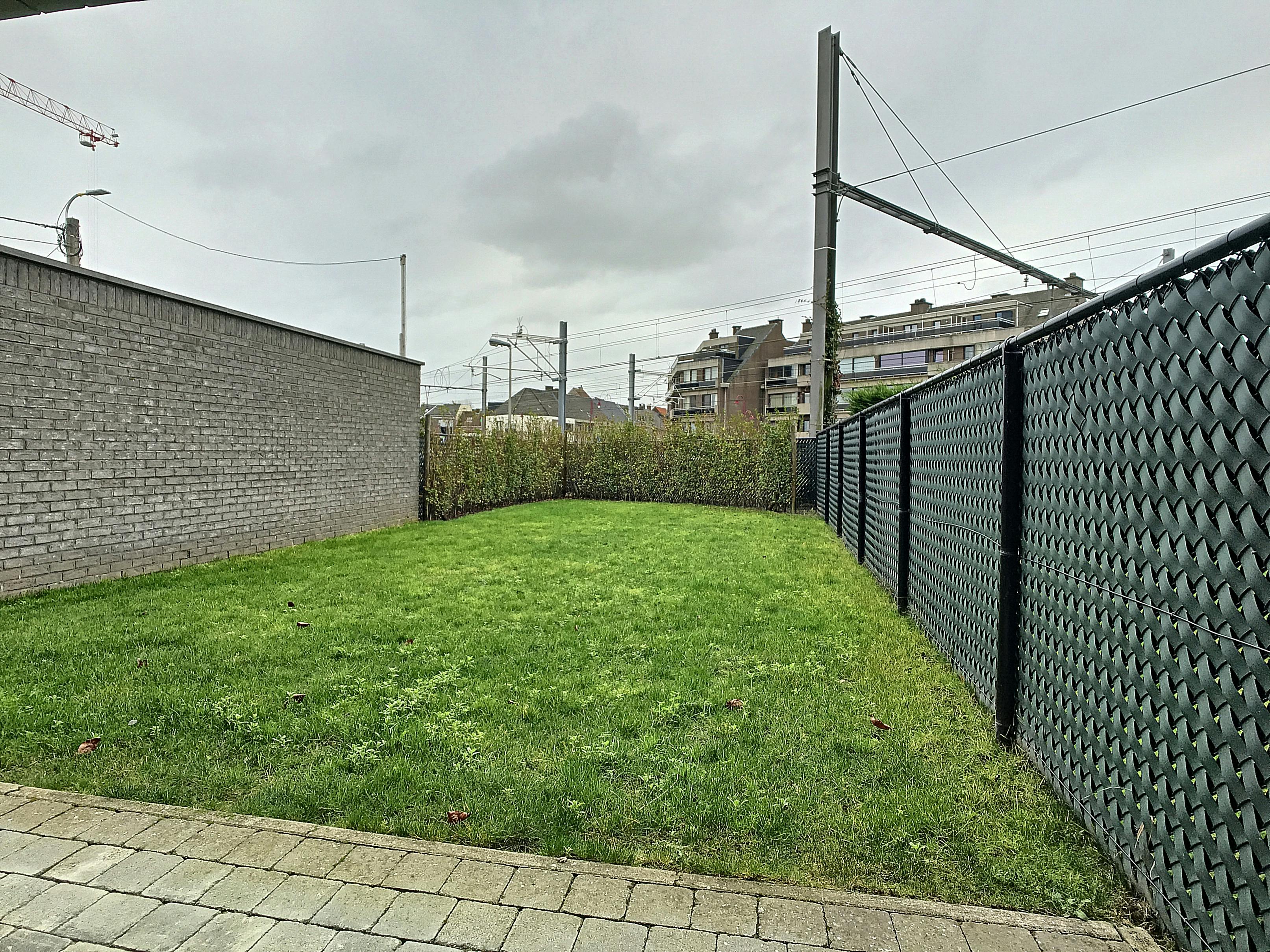 Gezellig gelijkvloers appartement met 2 slaapkamers en tuin foto 13