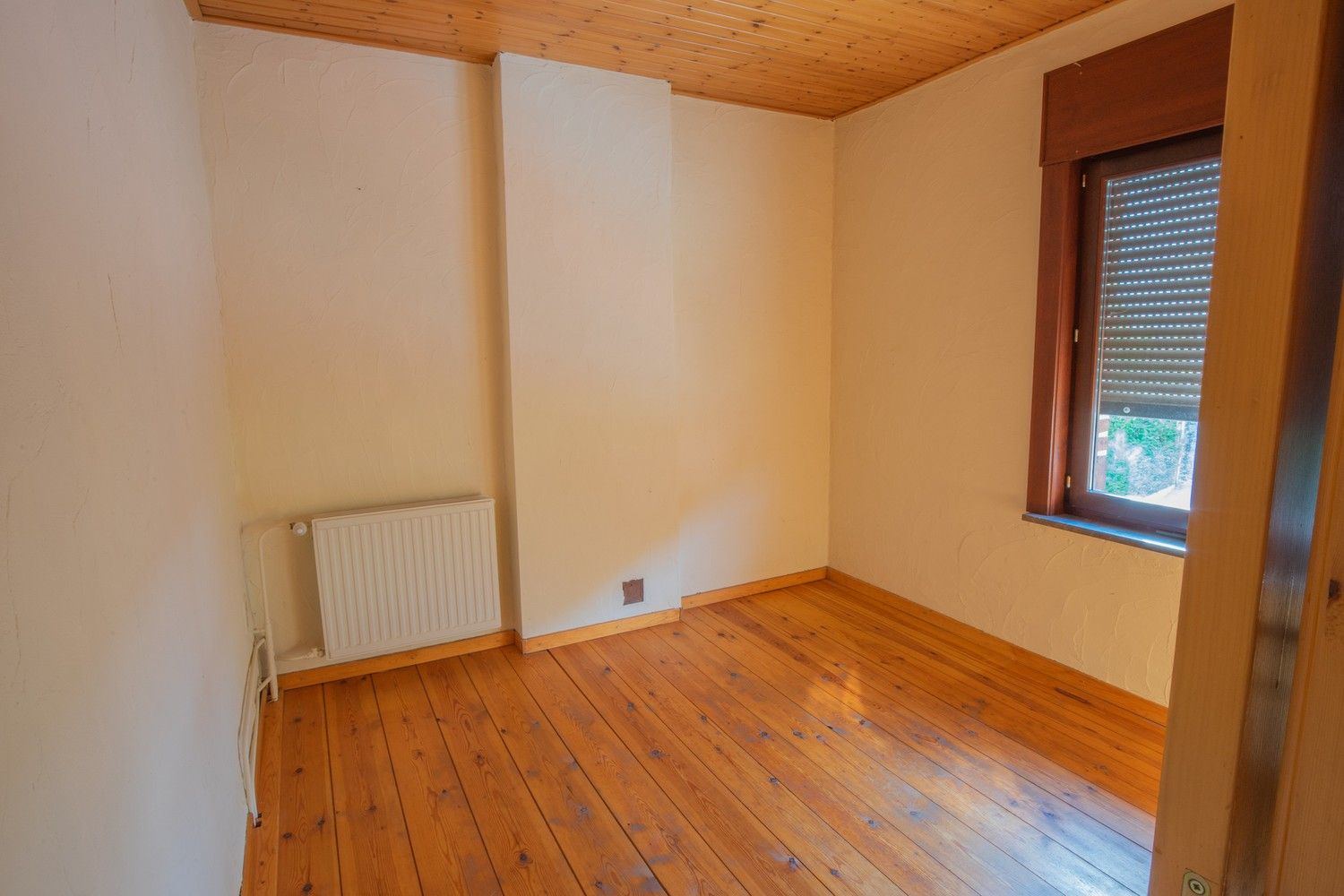 Charmante halfopen woning met 3 slaapkamers, ruime garage en gunstige ligging in Holsbeek foto 14
