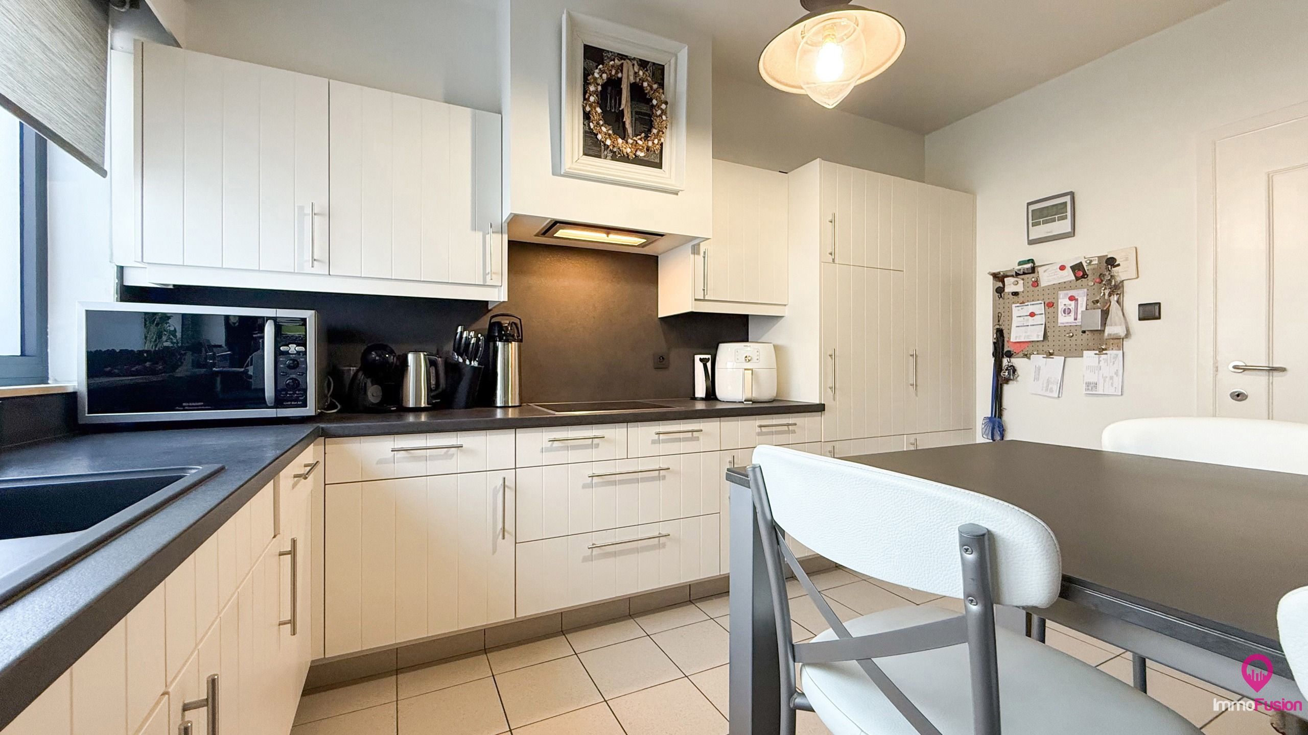 Instapklare bakkerij met woonst in het centrum van Zolder! foto 28