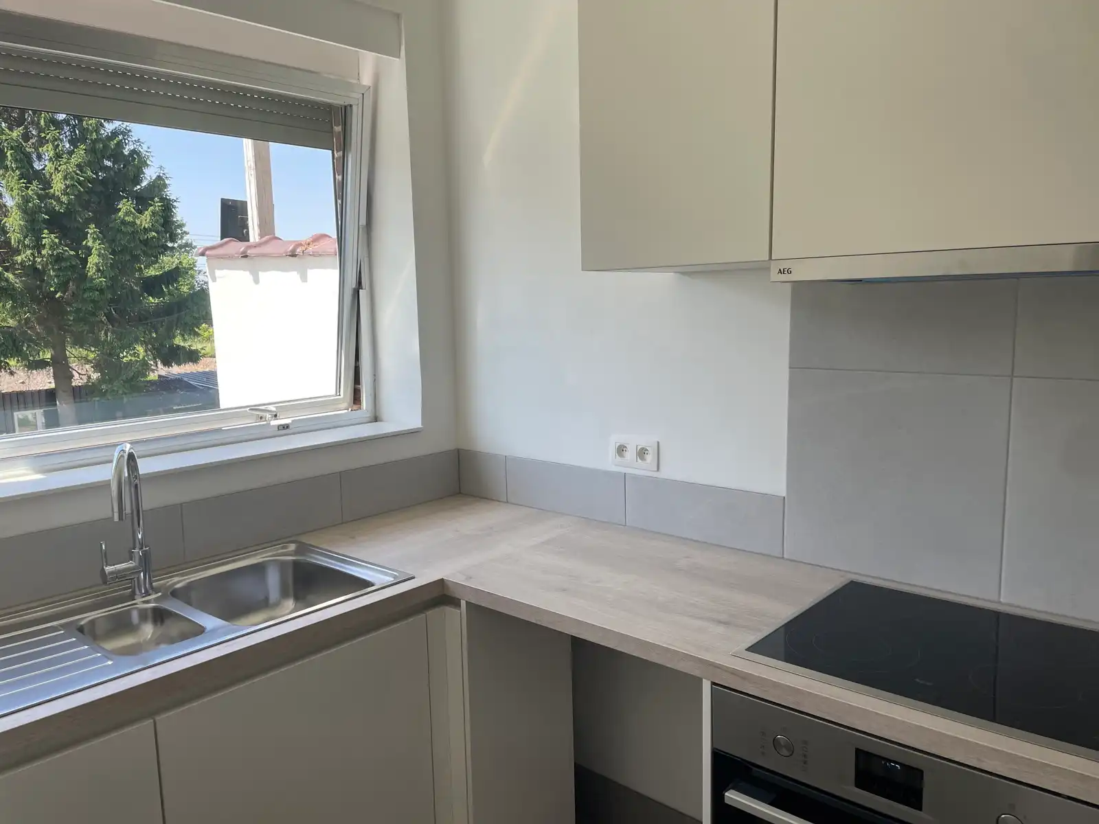 Leemans Immobiliën biedt u dit instapklare appartement te huur aan in Asse foto 10
