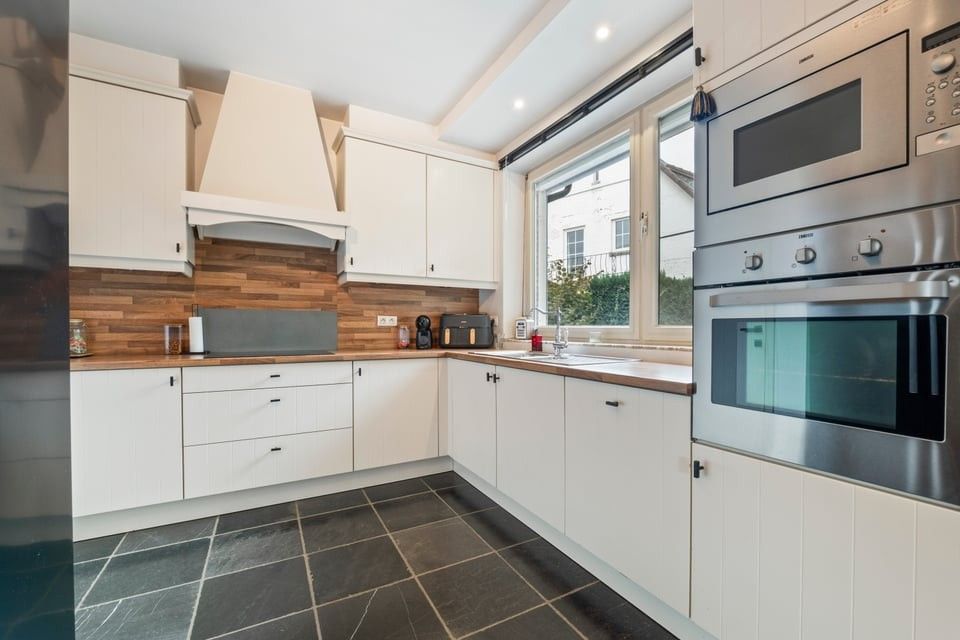 GEZELLIGE OPEN BEBOUWING MET LANDELIJKE CHARME OP EEN MOOI PERCEEL foto 11