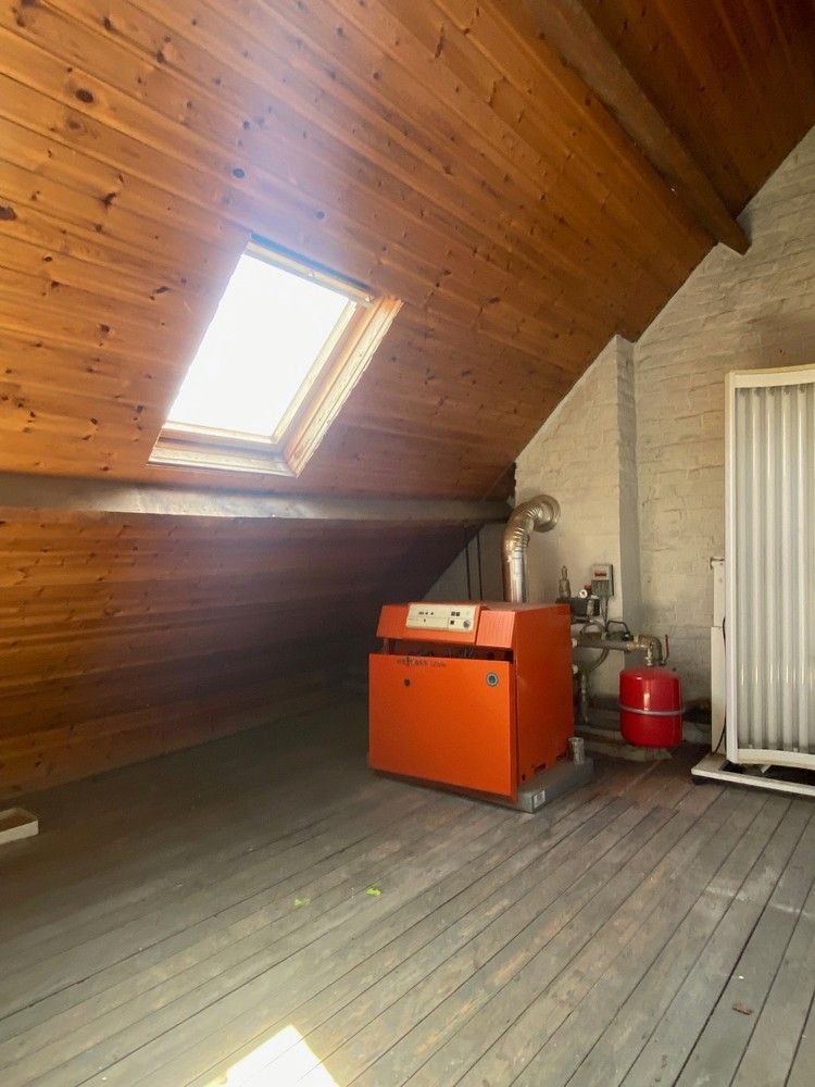 Ruime halfopen gezinswoning met grote garage/atelier (+/- 60m²) op een strategische ligging. foto 16