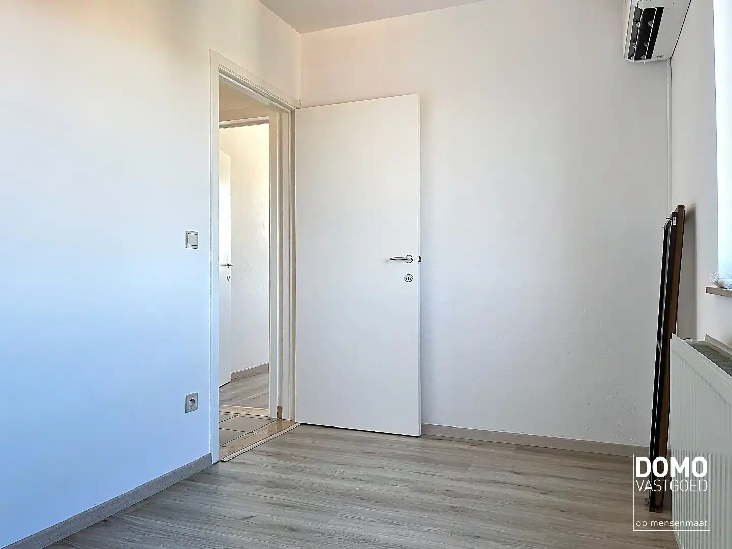 LICHTRIJK APPARTEMENT MET 2 SLAAPKAMERS EN GARAGEBOX foto 10