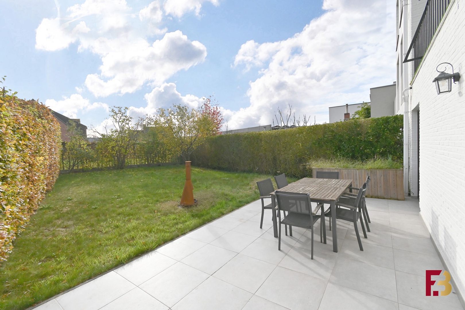 Gelijkvloersappartement met tuin en twee garages in hartje Zwijnaarde foto 17