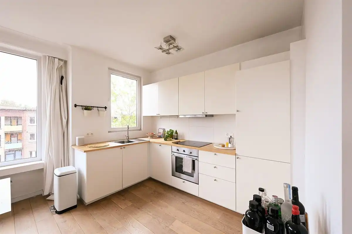 Supergezellig lichtrijk hoekappartement met 2 slpk foto 9