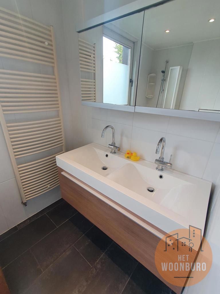 Woning open bebouwing met garage en tuin foto 8