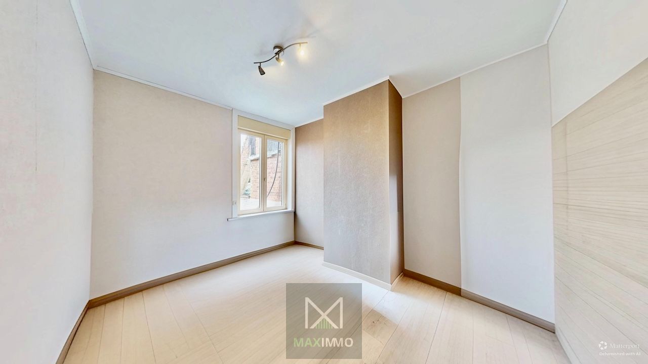 Instapklare, lichtrijke gezinswoning met grote tuin te Menen foto 10