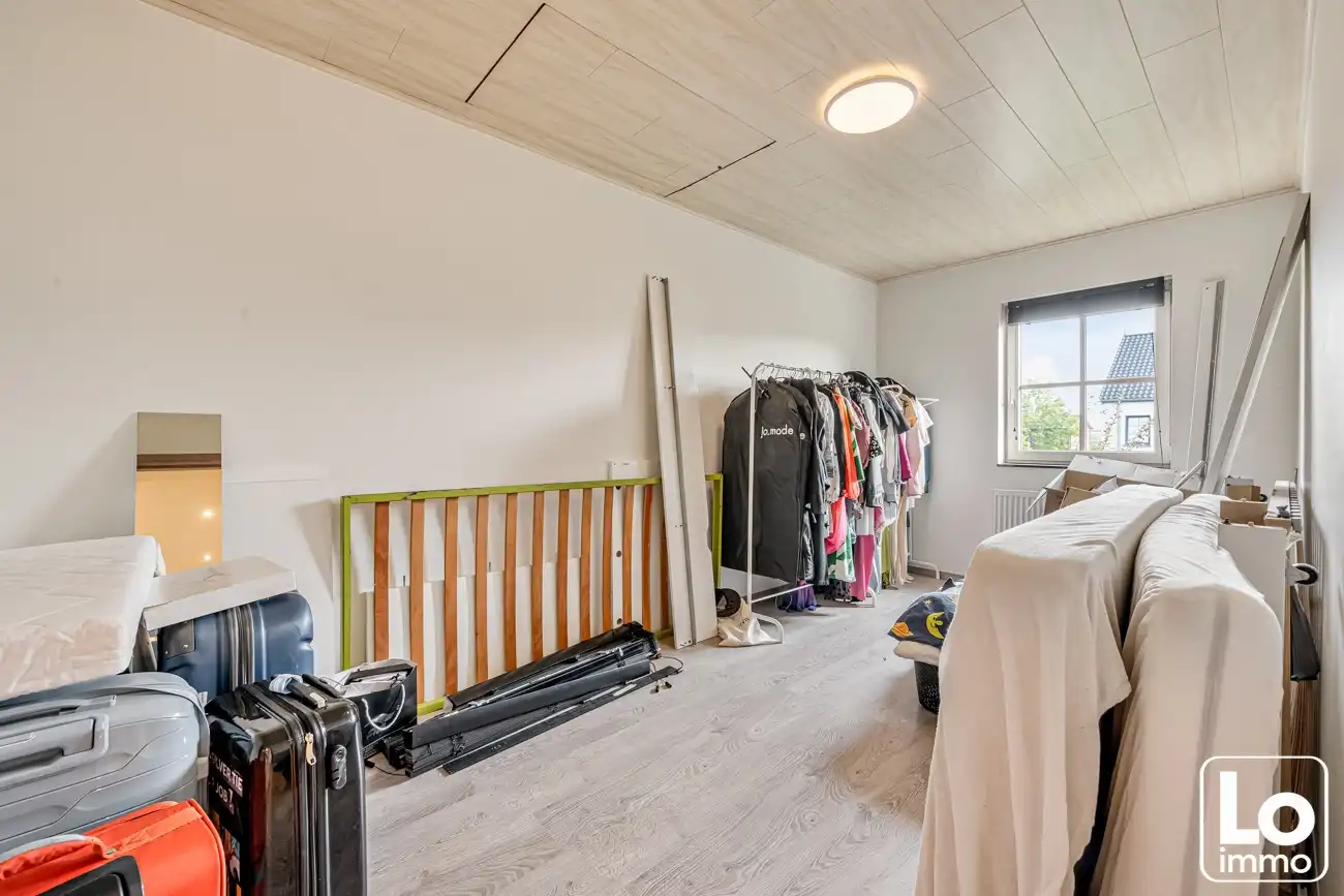 Instap klare ruime open woning met inpandige garage en een zuid georiënteerde tuin op een toplocatie nabij het centrum van Lochristi! foto 23