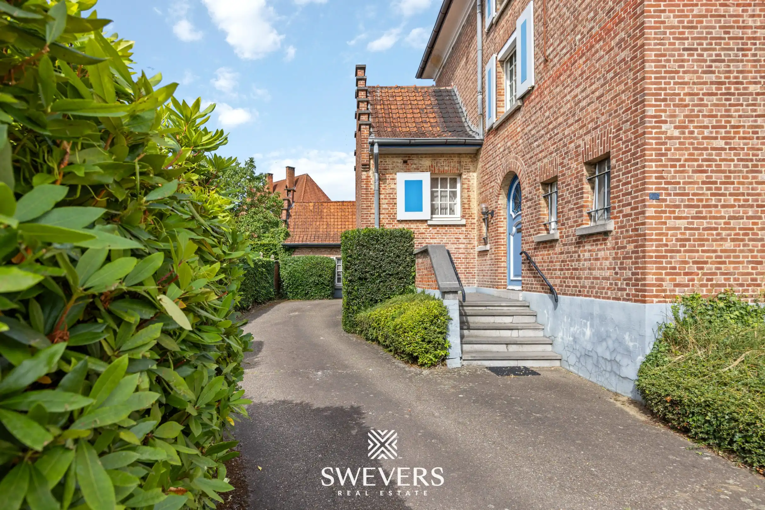 Unieke renovatiekans: ingenieurswoning met 5 slpk op ruim perceel in het hart van Beringen foto 2