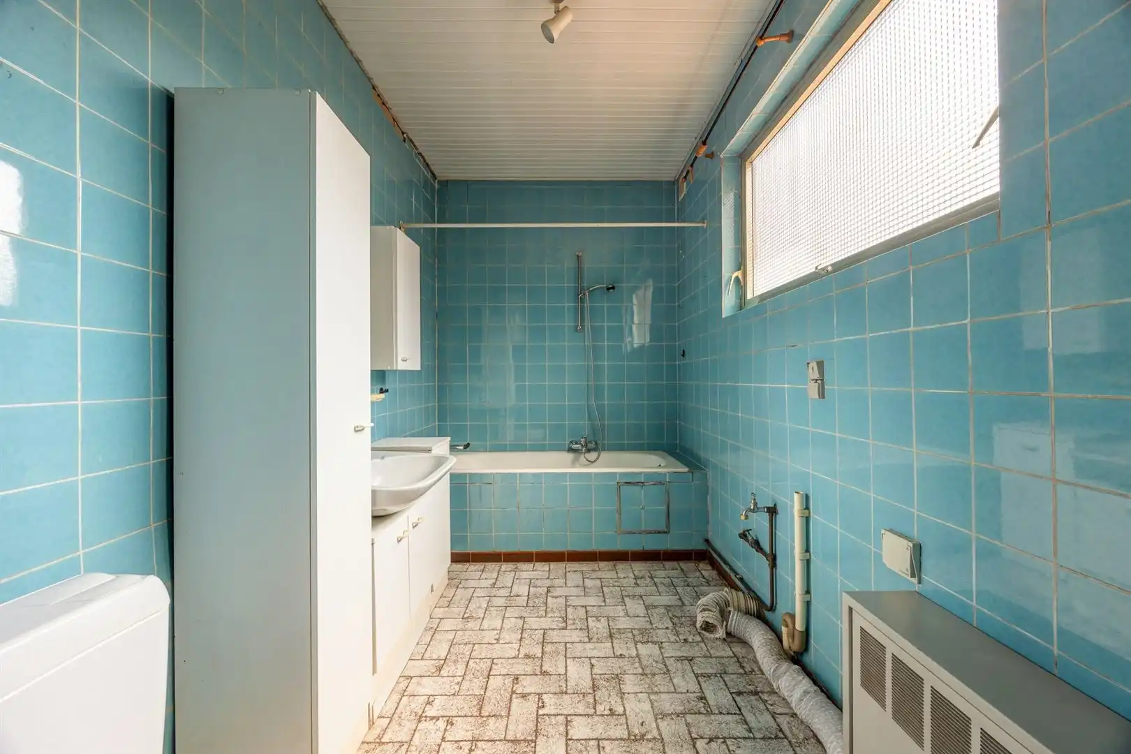 karaktervolle 3-slaapkamerwoning met grote zolder, diepe tuin en berging foto 9