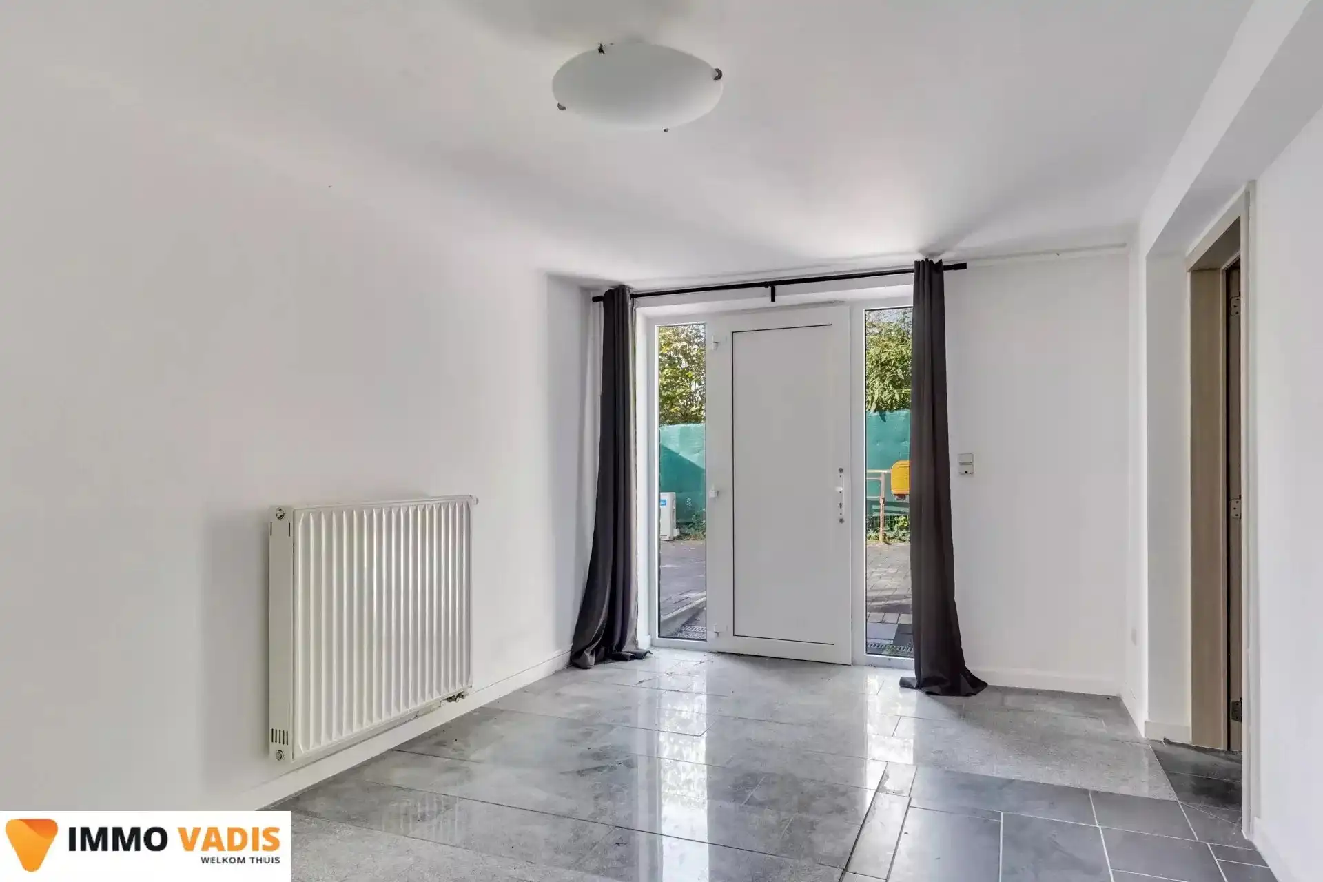 Ruim gelijkvloers appartement met  3 slaapkamers foto 14