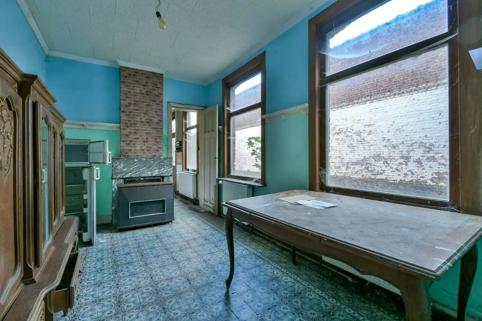 Te renoveren woningen met bijhorende loods! foto 5