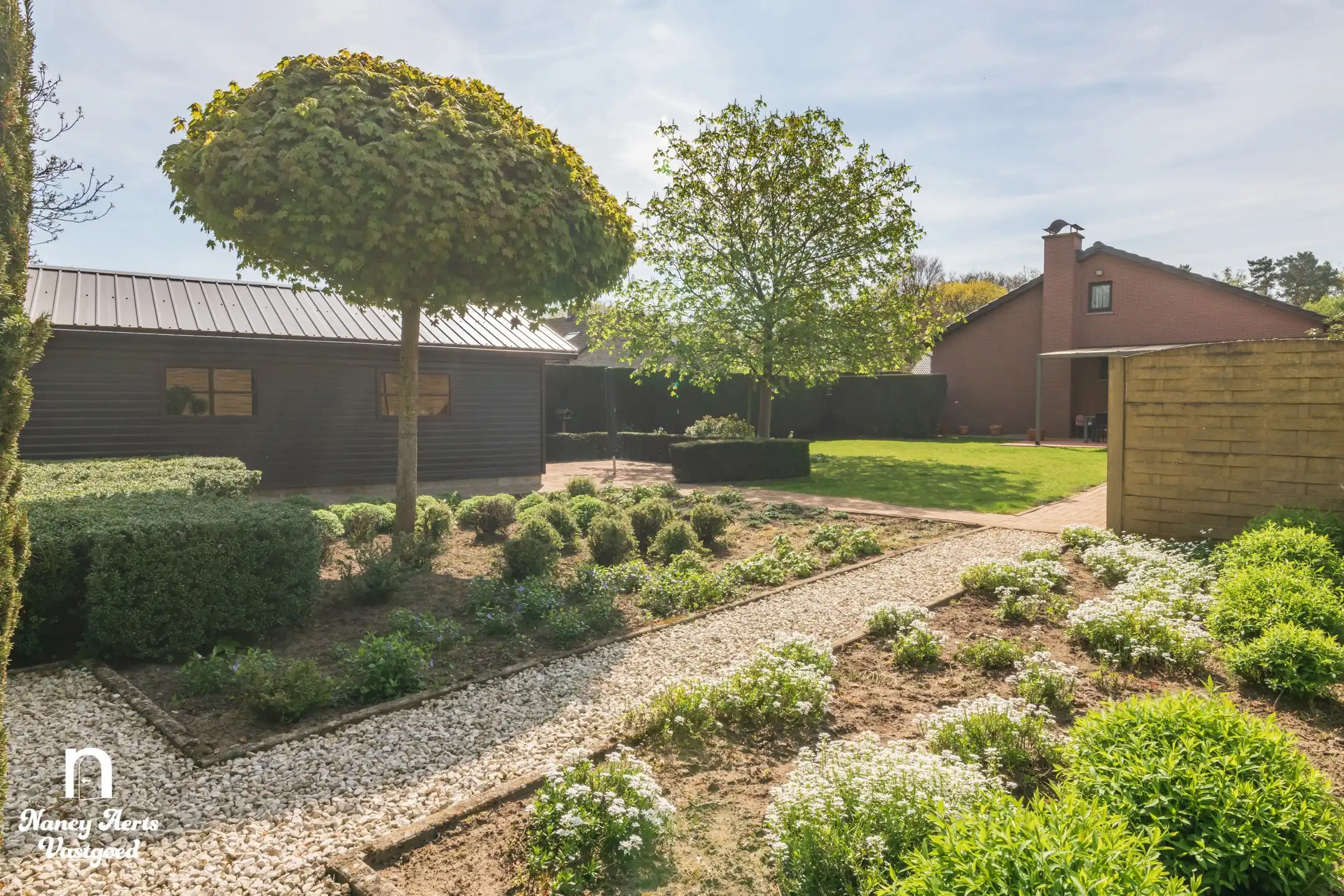 Lichtrijke woning met prachtige tuin en groeipotentieel foto 22
