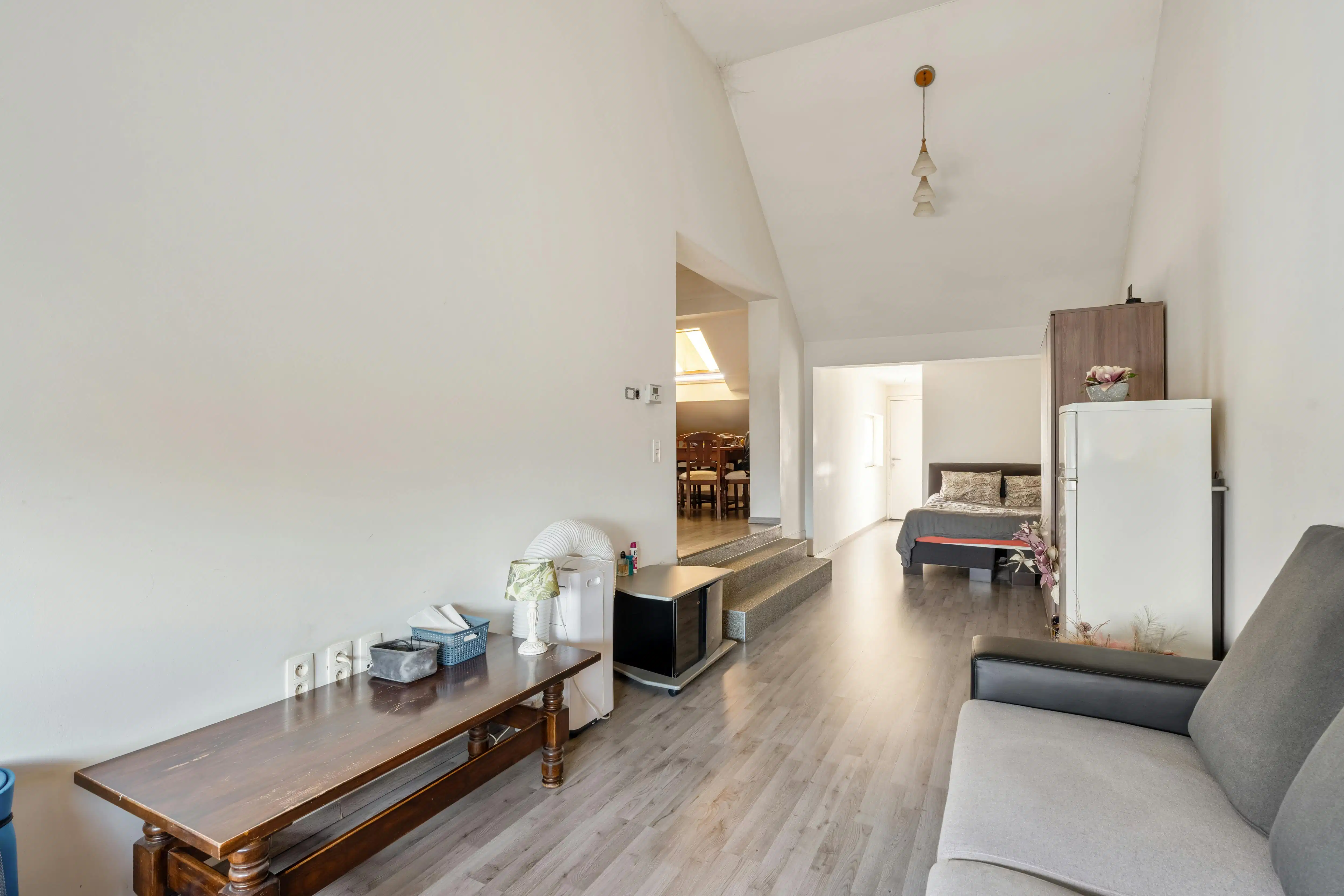 Rendabele opbrengsteigendom met handelspand, magazijn, woonst en 2 appartementen in Genk foto 14