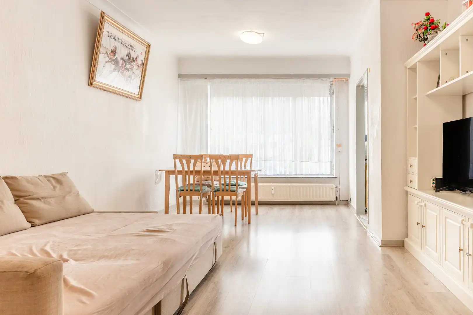 Gelijkvloers appartement met tuin foto 2