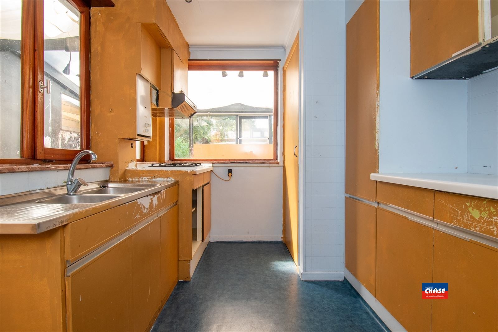 Te renoveren woning met 2 slpks en tuin foto 6