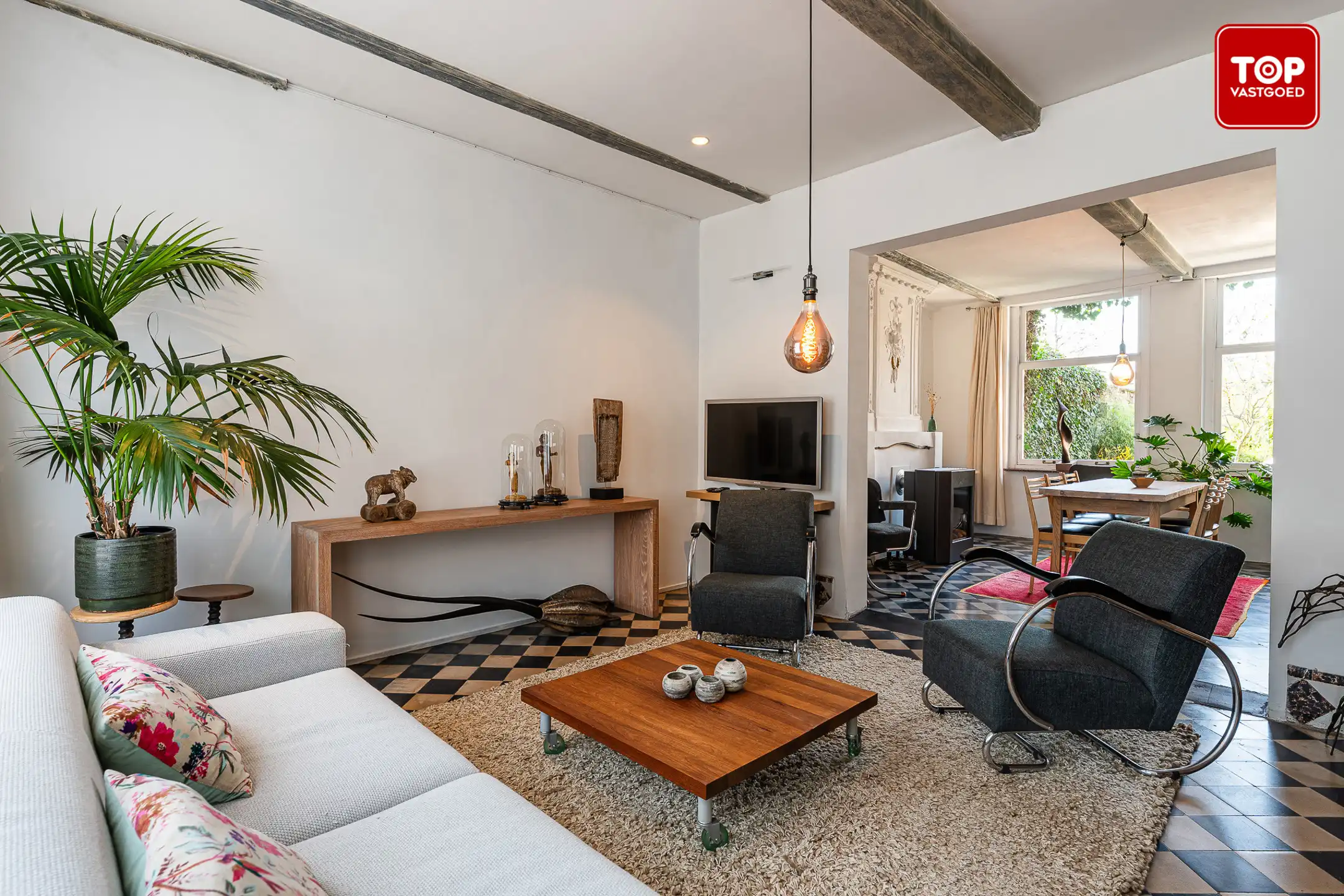 Authentieke en ruime woning met 3 slaapkamers, groot atelier en zonnige tuin foto 3