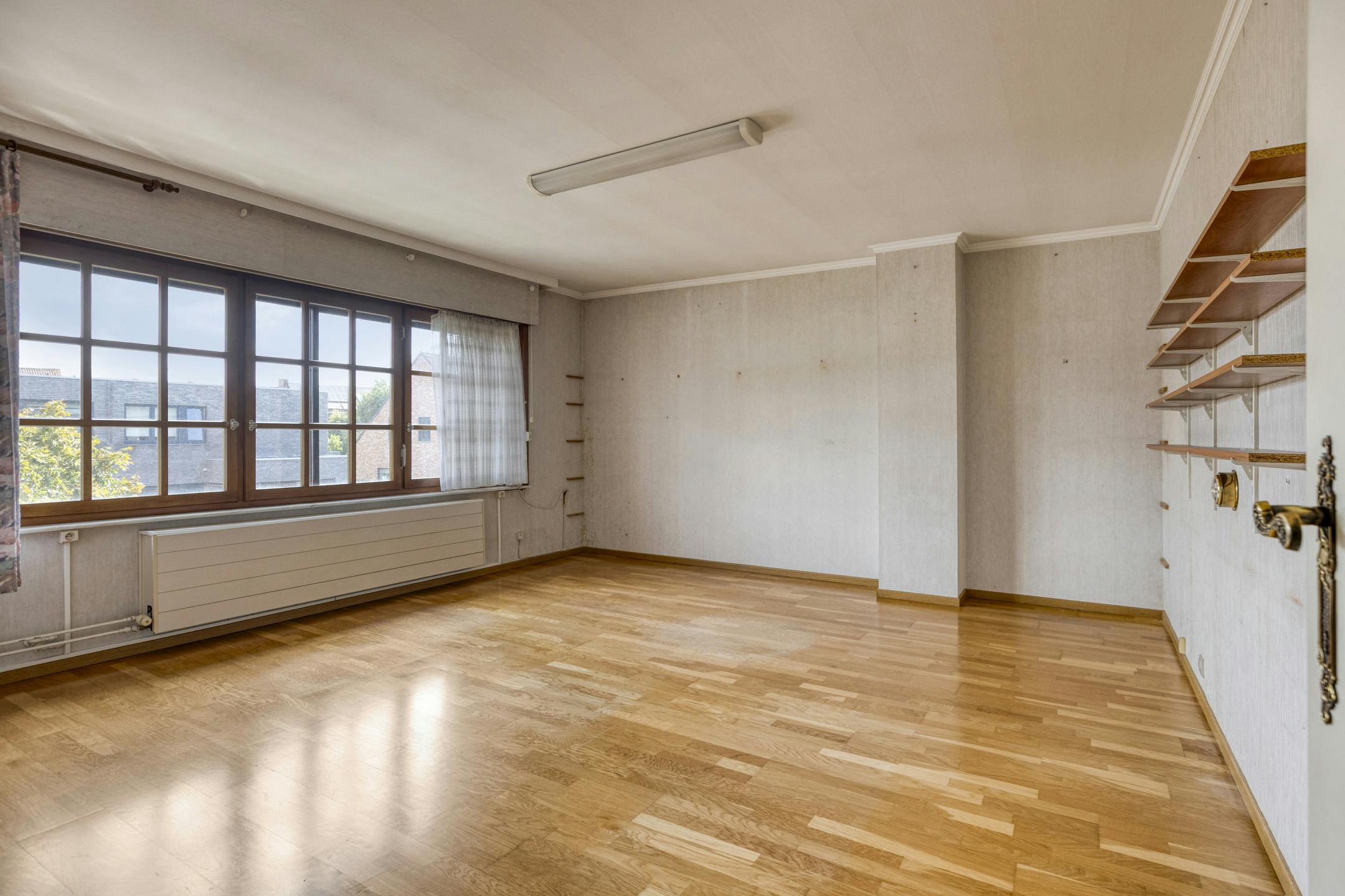 Halfopen huis te koop in Ieper met 4 kamers, tuin en garage foto 22