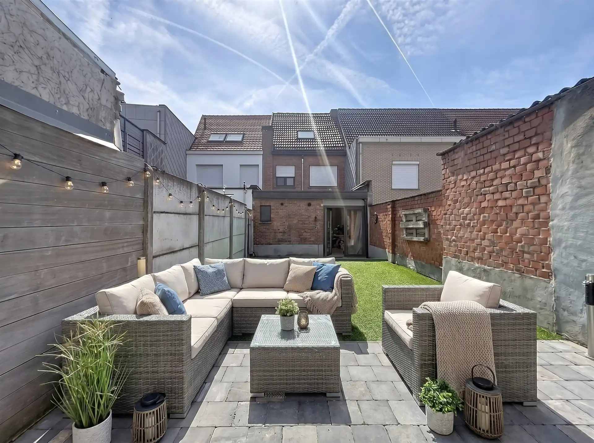 Instapklare woning met 3 slaapkamers en zonnige tuin in Burcht! foto {{pictureIndex}}