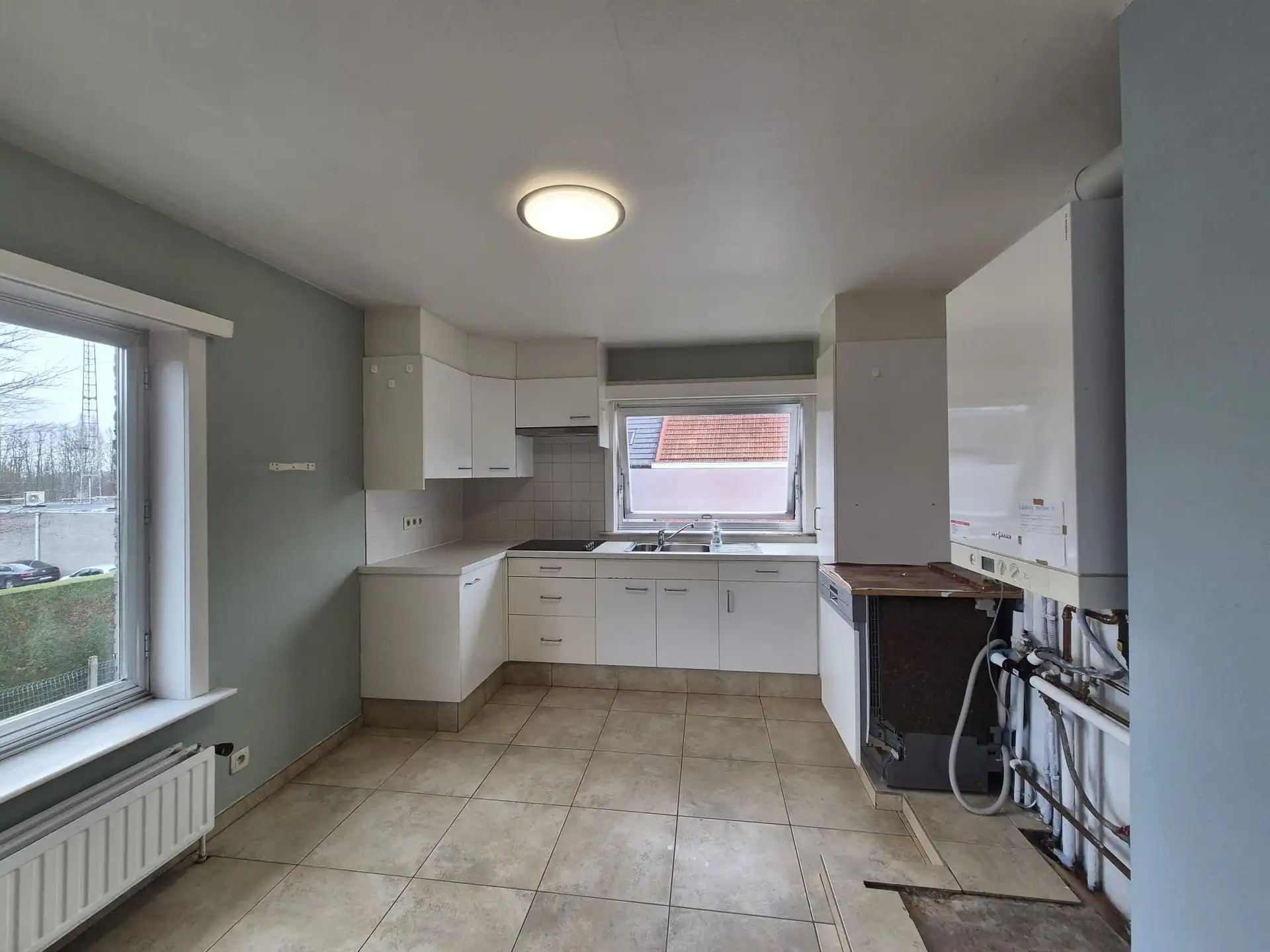 Centraal gelegen ruim appartement met groot zongericht terras en garage. foto 9