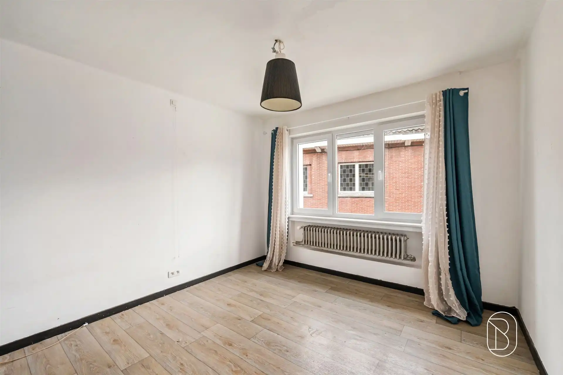 Groot huis met opslagruimte in het hart van Moeskroen foto 13