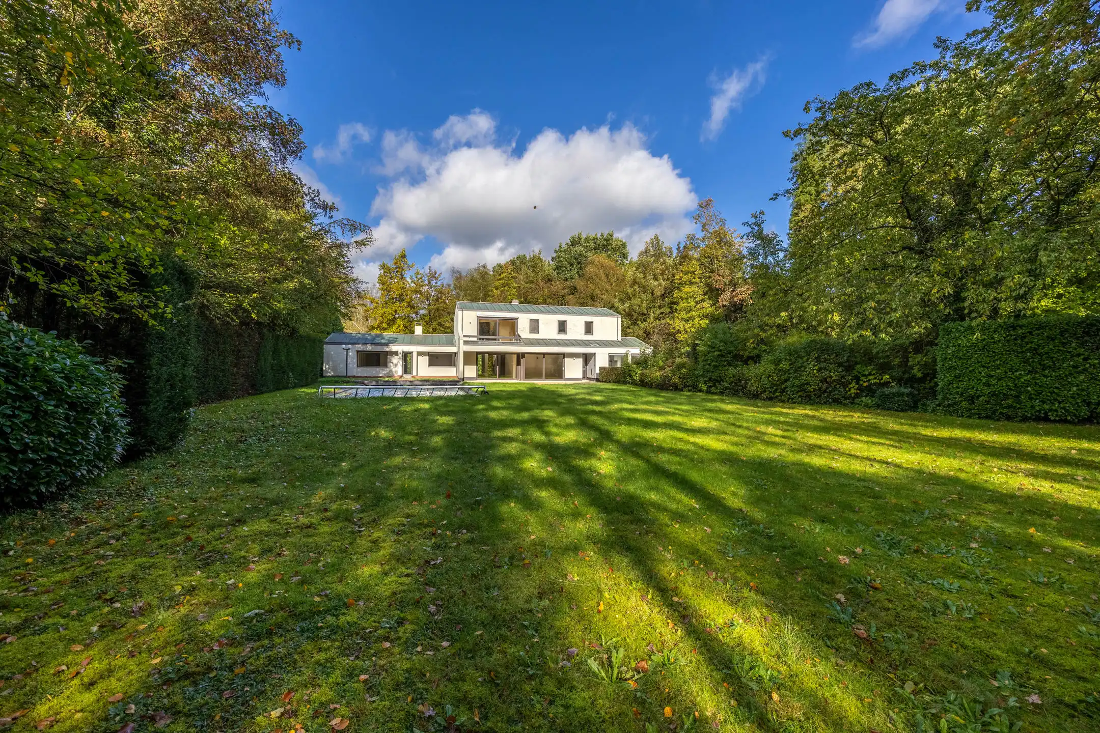 Seventiesvilla met zwembad en wellnessruimte in het groen  foto 24