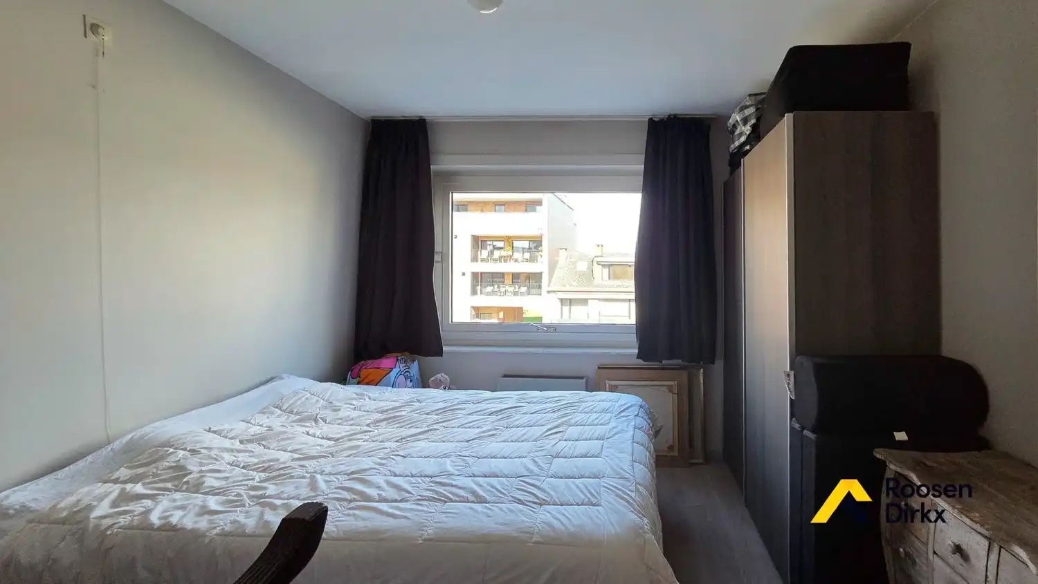 Verzorgd tweeslaapkamerappartement met parkeerplaats in centrum Bree. foto 13